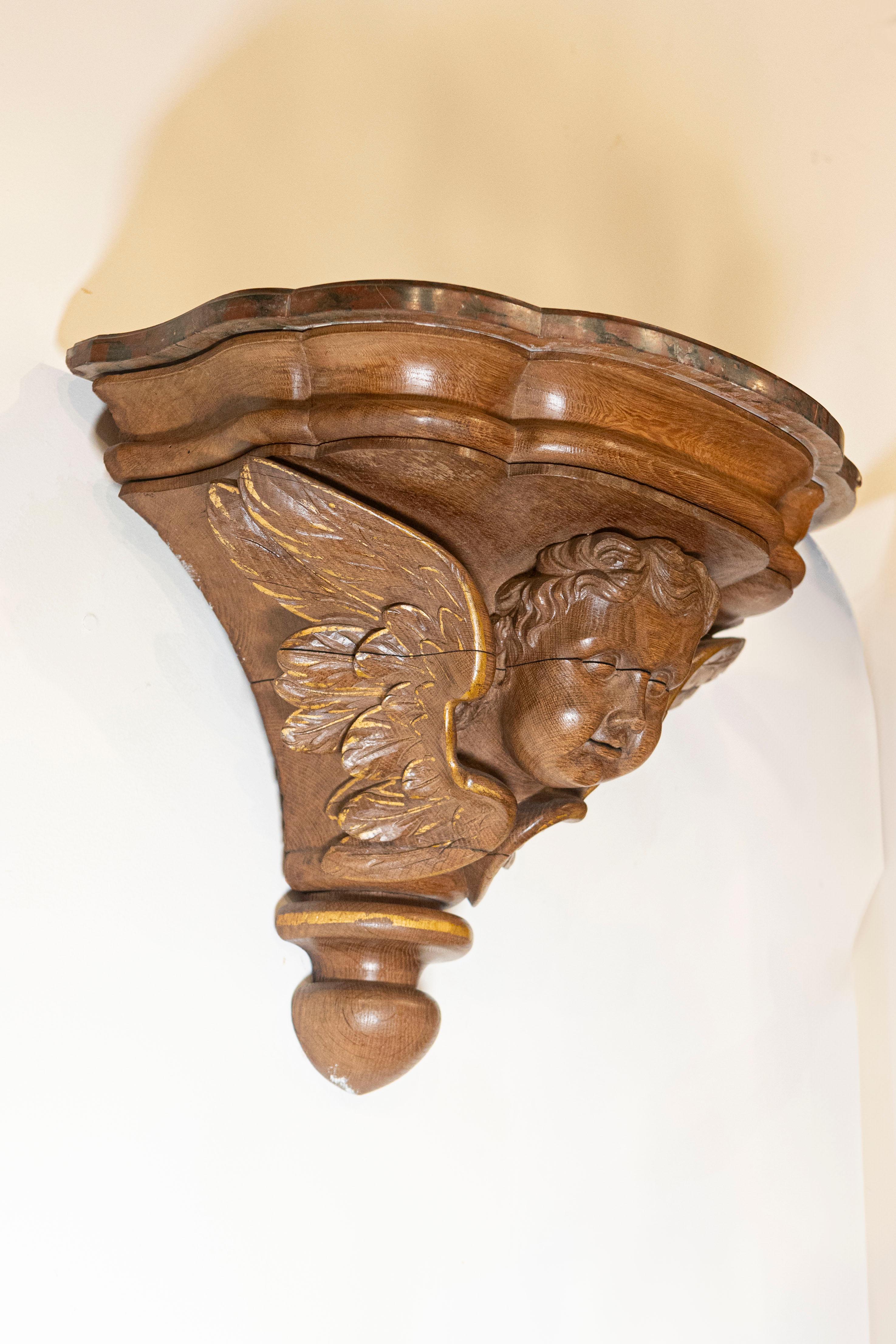 Pair of French 1880s Carved Walnut Brackets with Cherubs and Faux Marble Tops For Sale 2