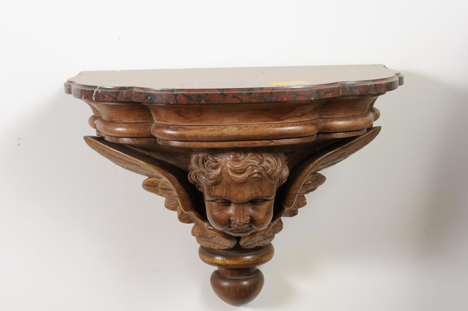 Pair of French 1880s Carved Walnut Brackets with Cherubs and Faux Marble Tops For Sale 4