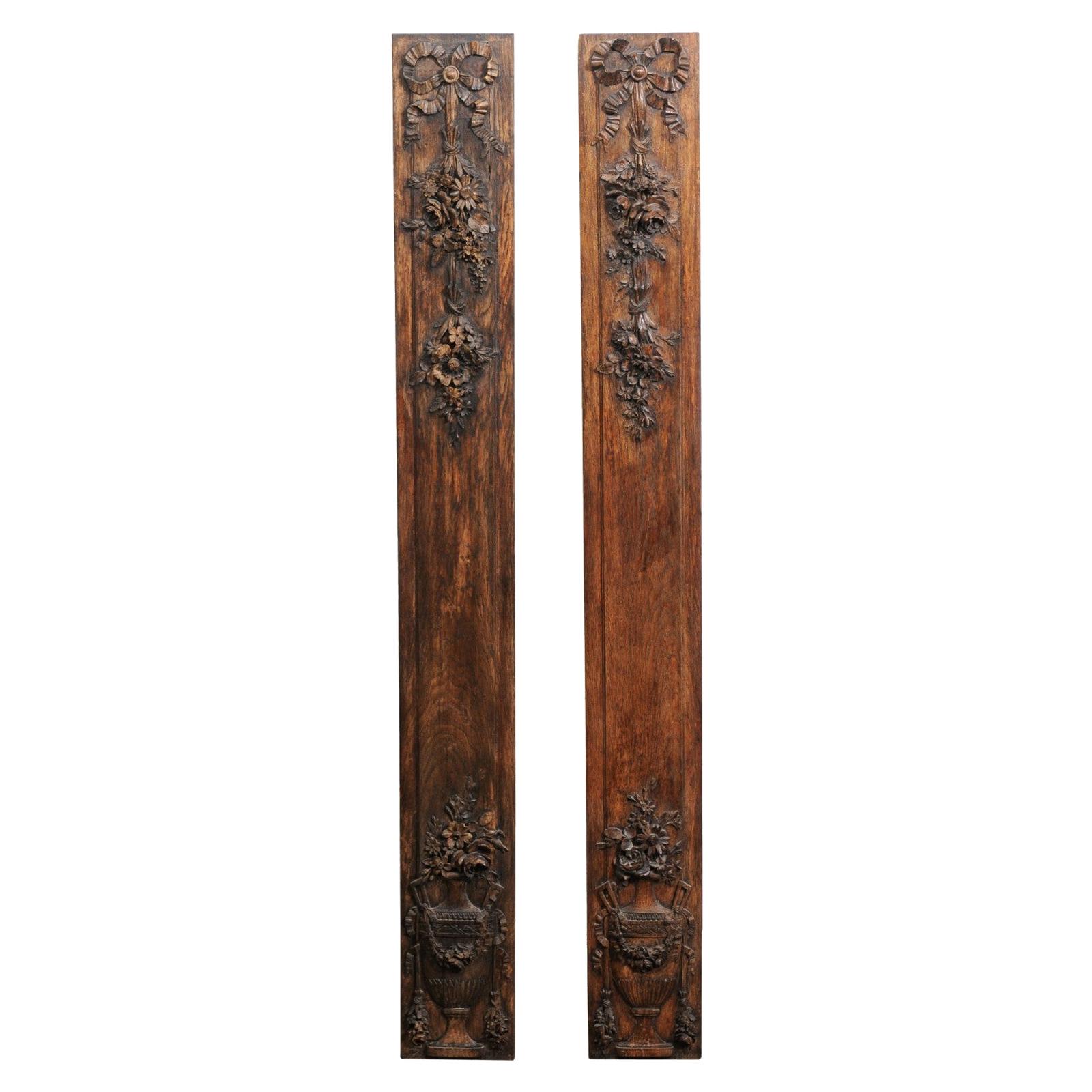 Pair of French 1890s Carved Wooden Panels with Ribbon-Tied Bouquets and Urns For Sale