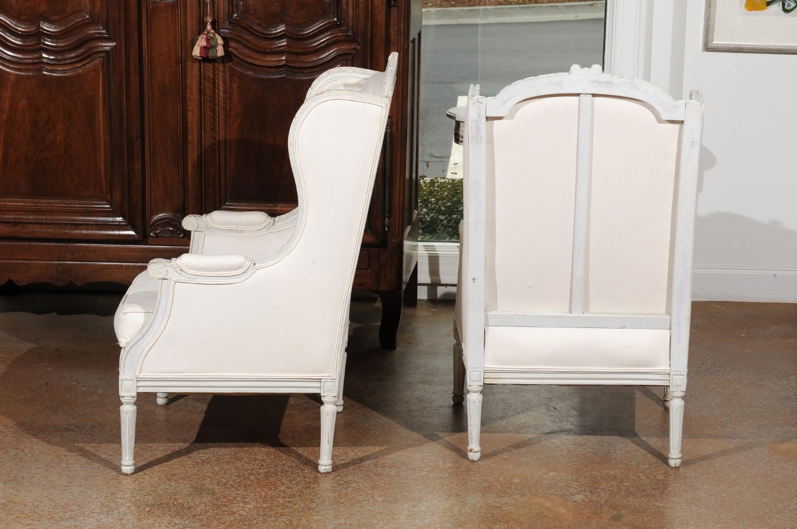 Pair of French 1890s Louis XVI Style Painted Wood Bergère Chairs with Upholstery For Sale 1