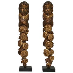 Pair of French 18th Century Baroque Giltwood Ornaments with Angel Heads