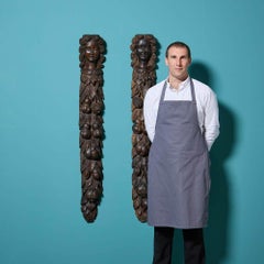 Coppia di cariatidi francesi in legno di noce intagliato del XVIII secolo