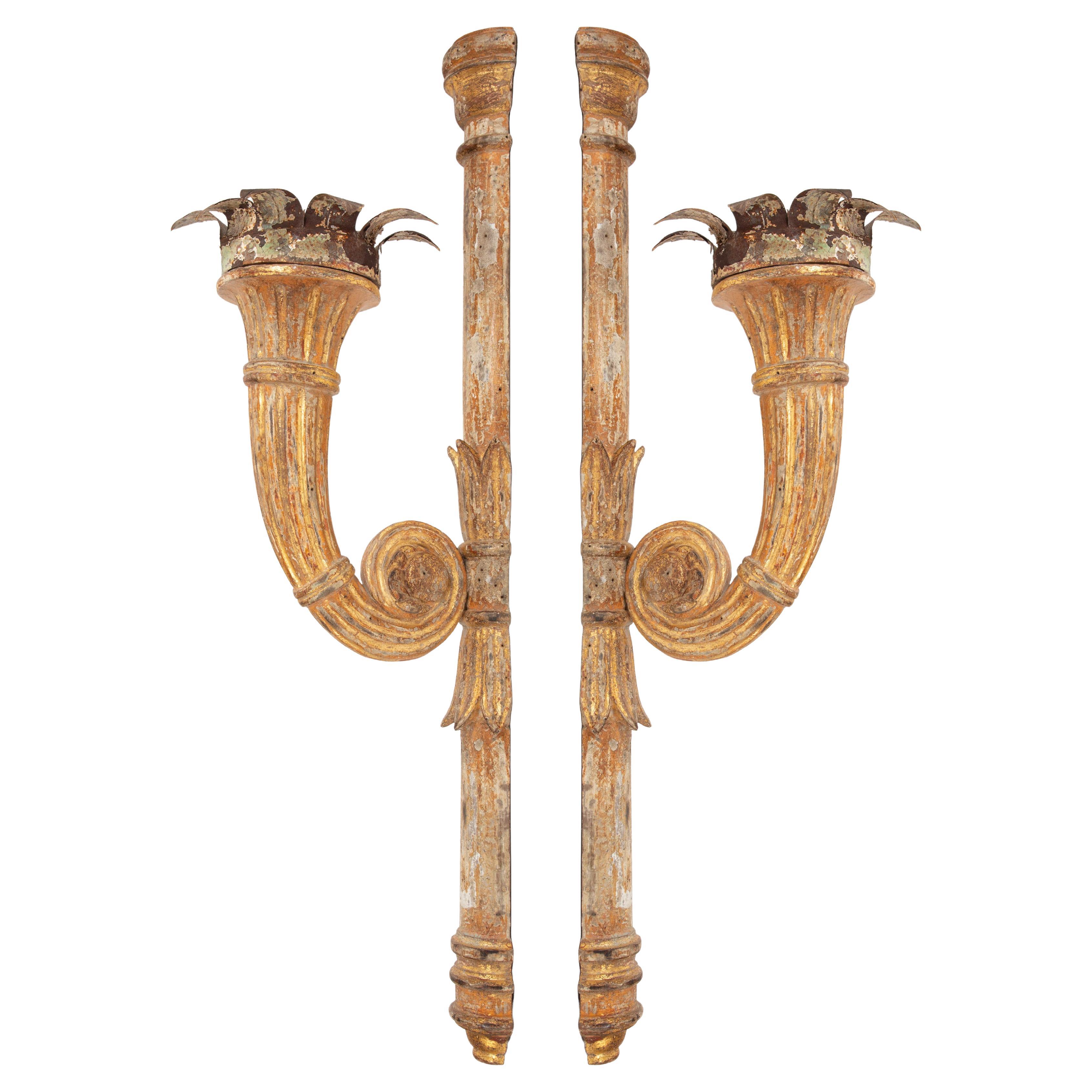 Pair of French 18th-Century Giltwood Torchères with Scrolling Arms For Sale