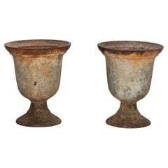 Pair of French 18th Century Iron Urns