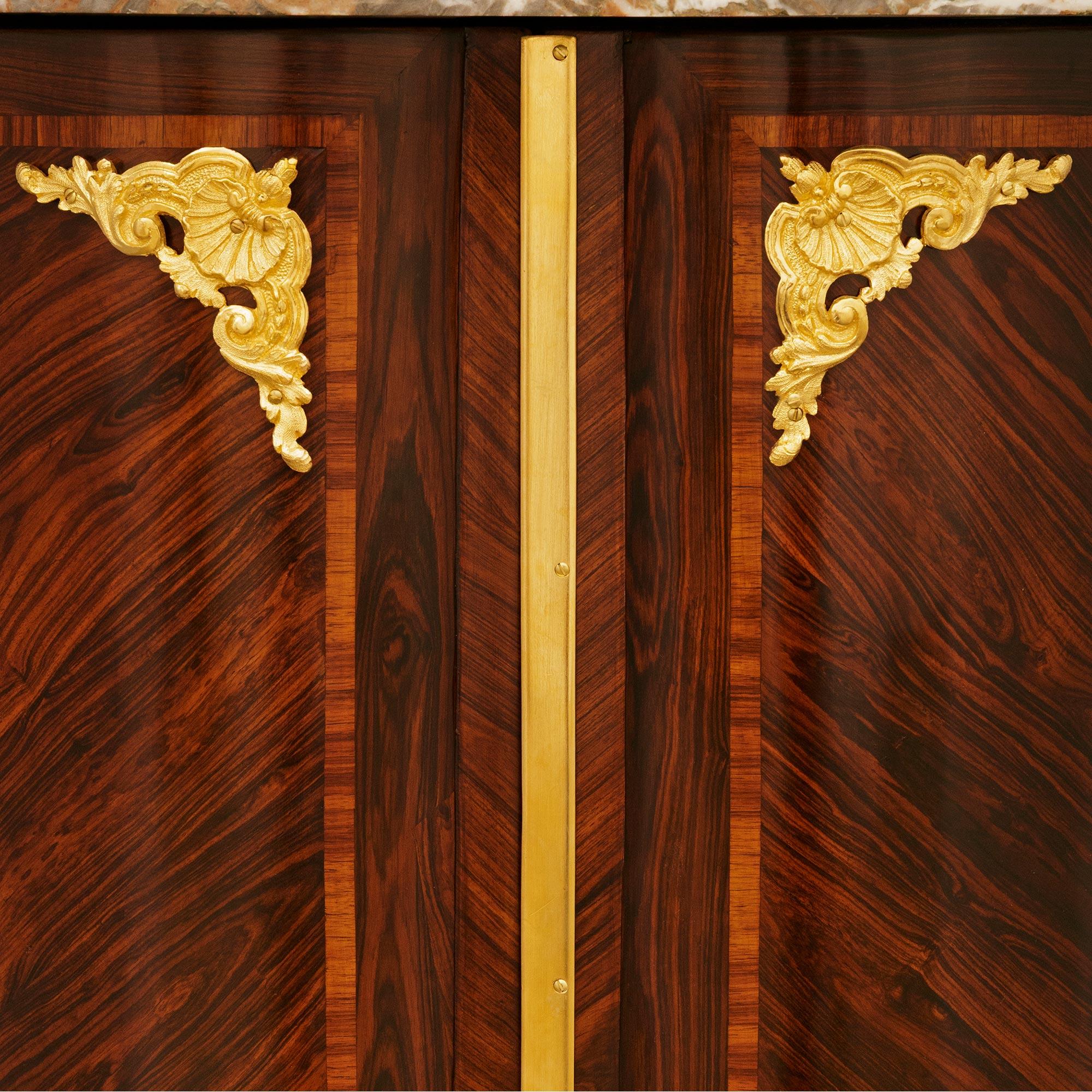 pair of French 18th century Kingwood, Ormolu and Rouge Marble corner cabinets For Sale 2