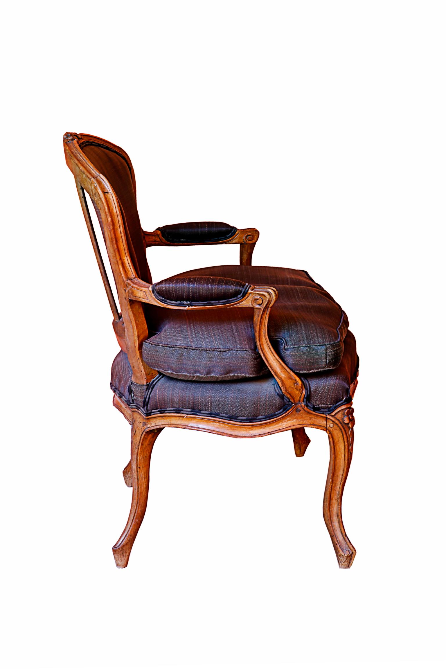 Carved Pair of French 18th Century Louis XV Walnut Armchairs For Sale