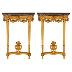 Paire de consoles françaises d'époque Louis XVI du 18ème siècle en bois doré et marbre