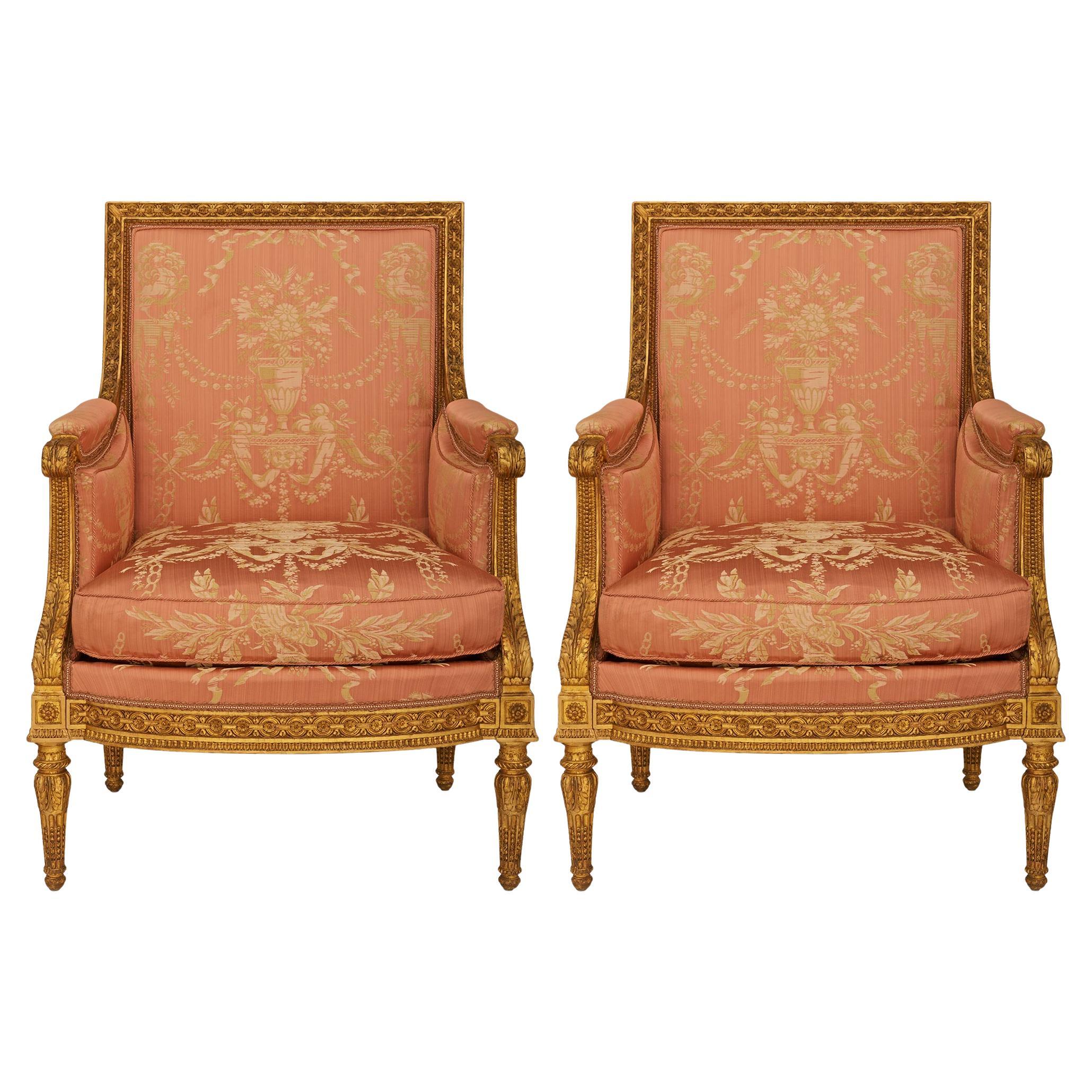 pair of French 18th century Louis XVI Period Giltwood Bergère armchairs