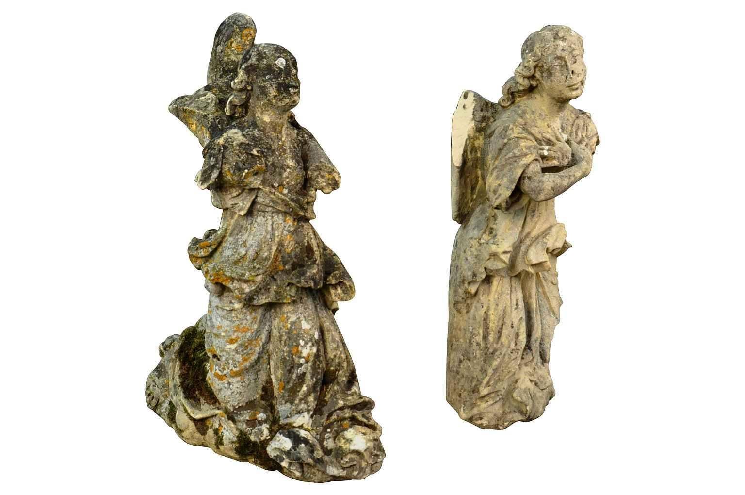 An exceptional and exquisite pair of 18th century French hand carved stone angels from the Provence region. Breathtaking - a magnificent addition to any interior or garden.