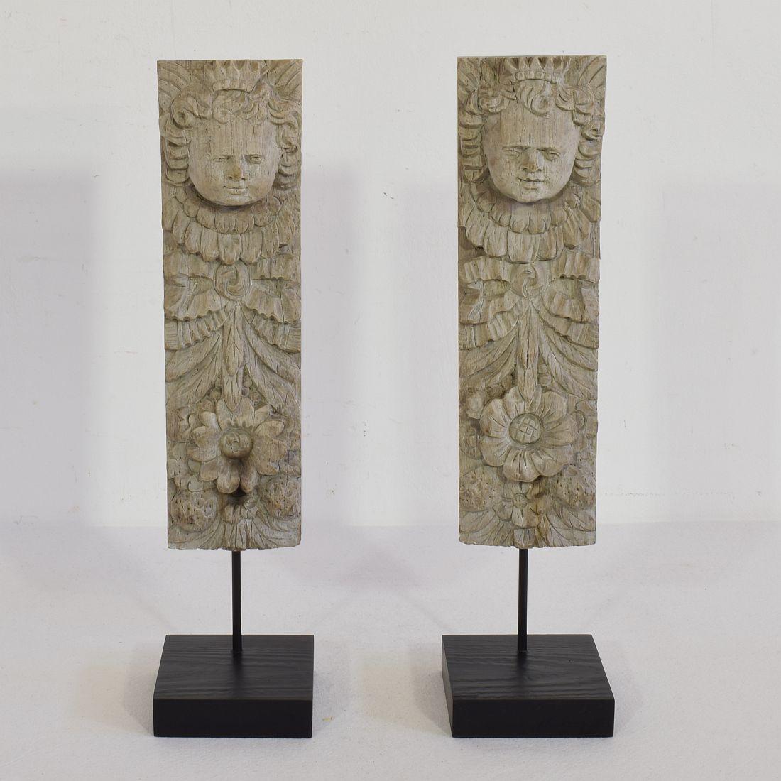 Pair of beautiful weathered ornaments, 
France, 18th century. Weathered.










 