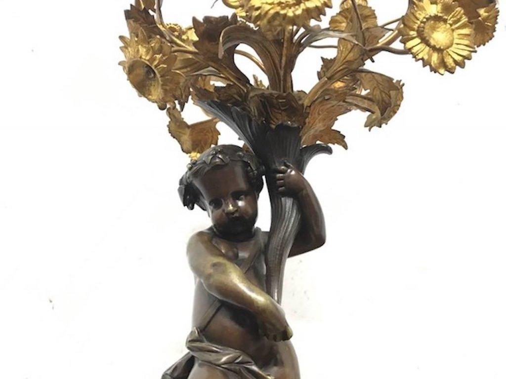 XIXe siècle Paire de chandeliers en bronze coulé Putti 'Cherub' du 19ème siècle en vente