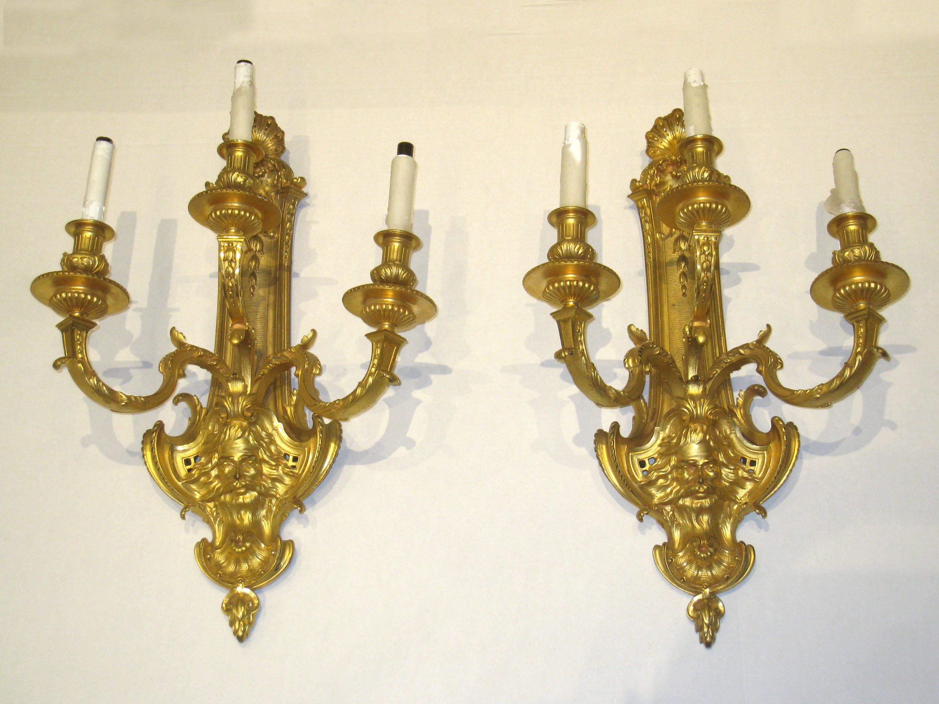Pair of finest quality French 19th century Louis XV style gilt bronze 3-light sconces.