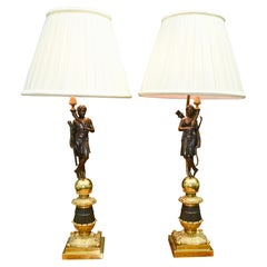 Pair of French 19 Century Neoclassical Figurative Bronze Lamps