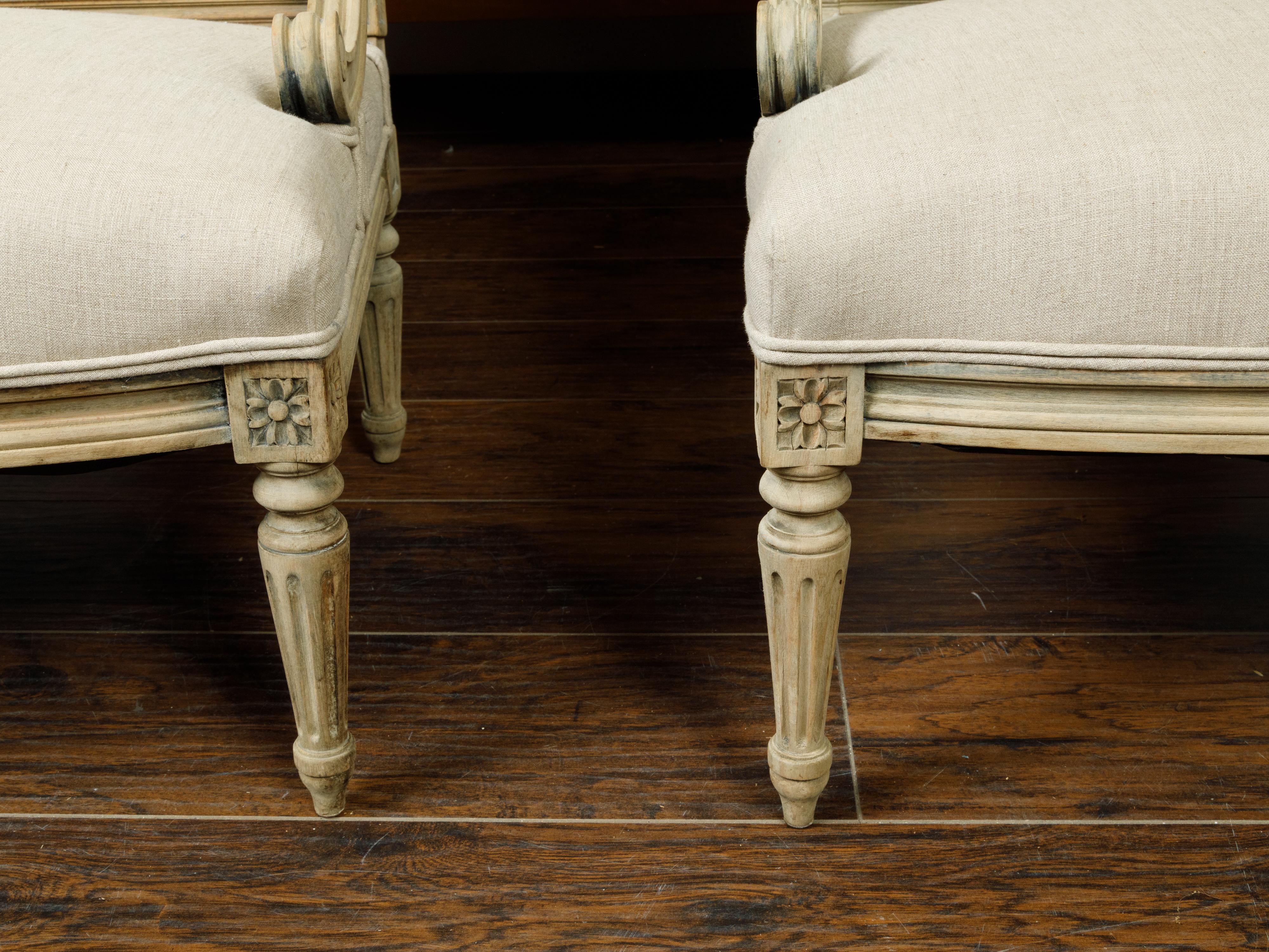 Pair of French 1900s Louis XVI Style Walnut Settees with Scrolling Arm Supports In Good Condition For Sale In Atlanta, GA