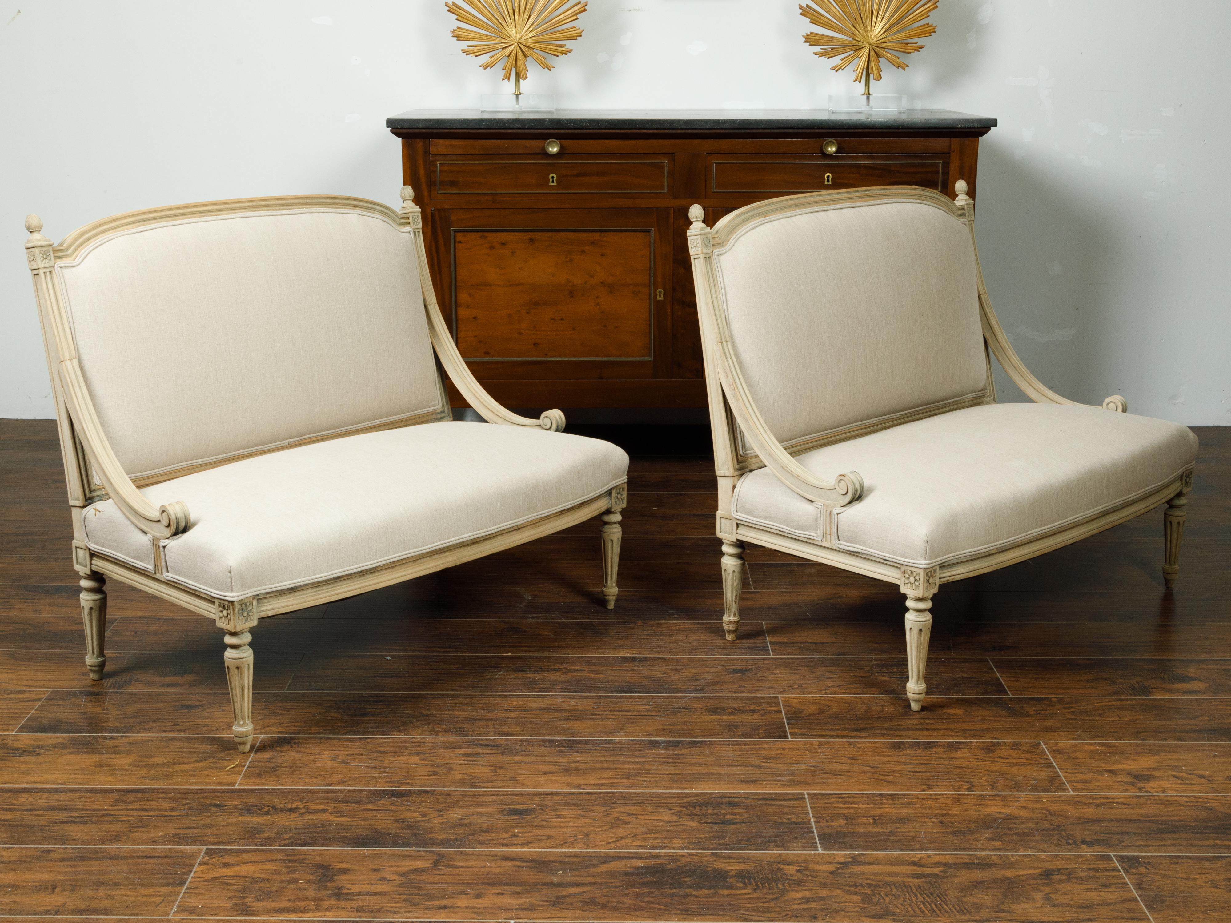 Upholstery Pair of French 1900s Louis XVI Style Walnut Settees with Scrolling Arm Supports For Sale