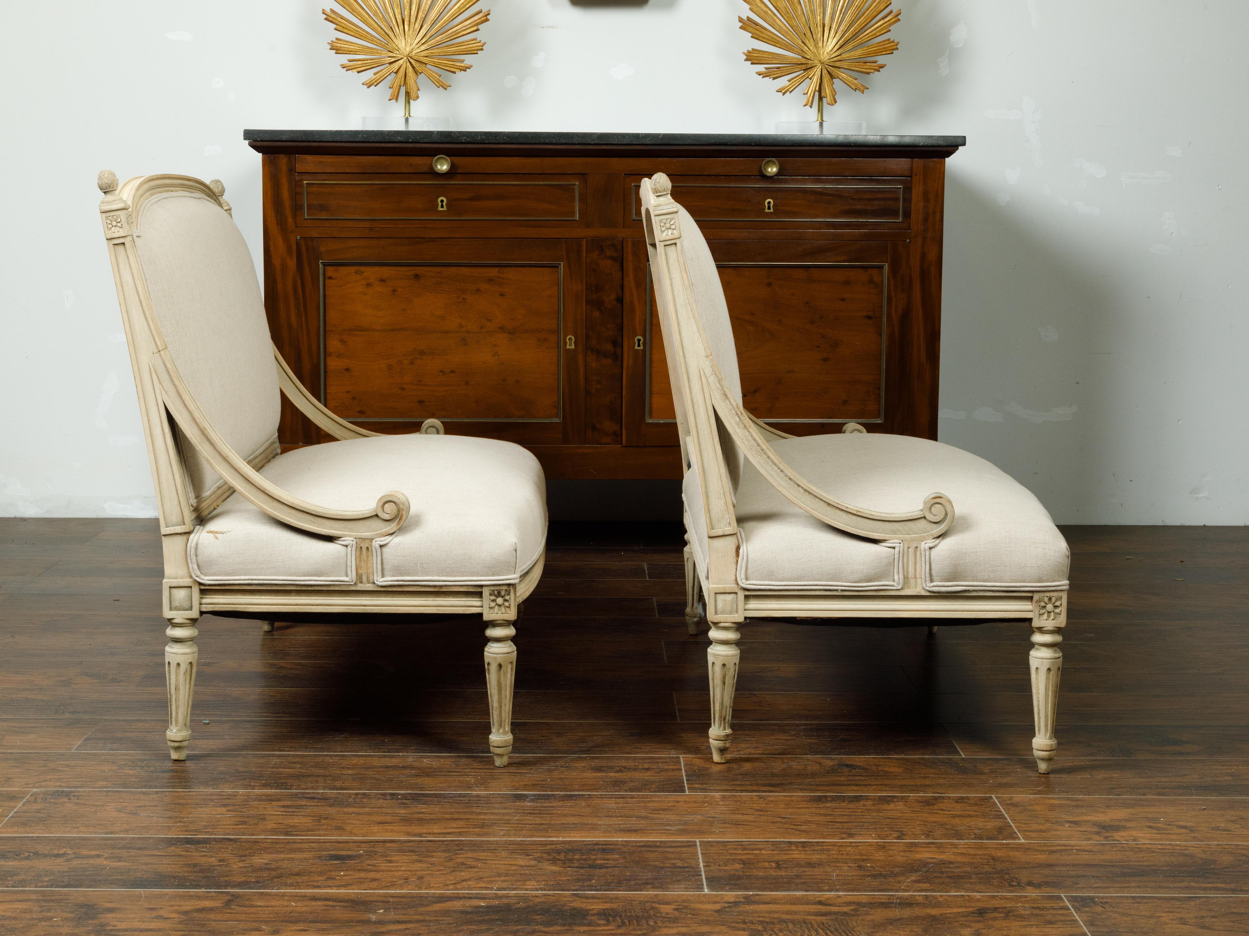 Pair of French 1900s Louis XVI Style Walnut Settees with Scrolling Arm Supports For Sale 1
