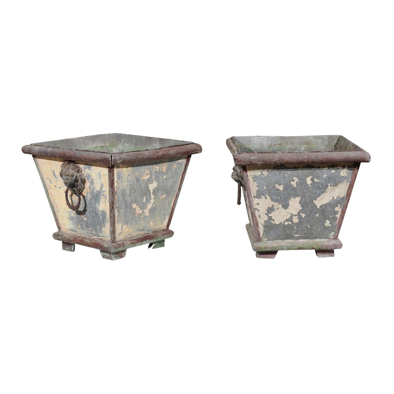 Pair of French 1900s Zinc Planters with Weathered Patina and Lion Head Motifs