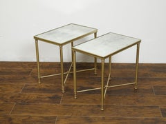 Pair of French 1920s Bronze Side Tables with Mirrored Tops and Cross Stretchers