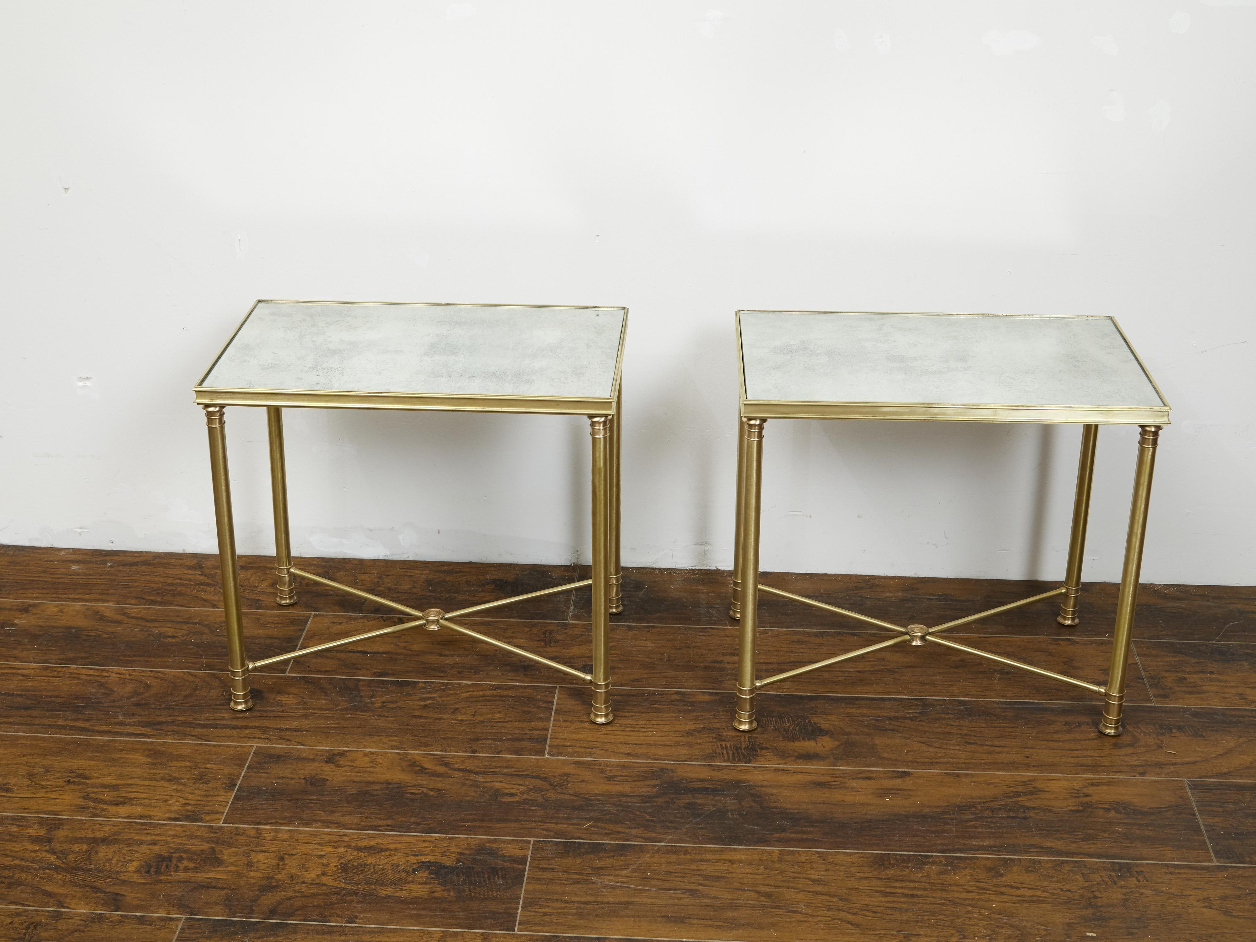 Pair of French 1920s Bronze Side Tables with Mirrored Tops and Cross Stretchers In Good Condition In Atlanta, GA