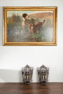 Pair of French 1920s Iron Three-Light Lanterns with Scrolling Motifs and Foliage