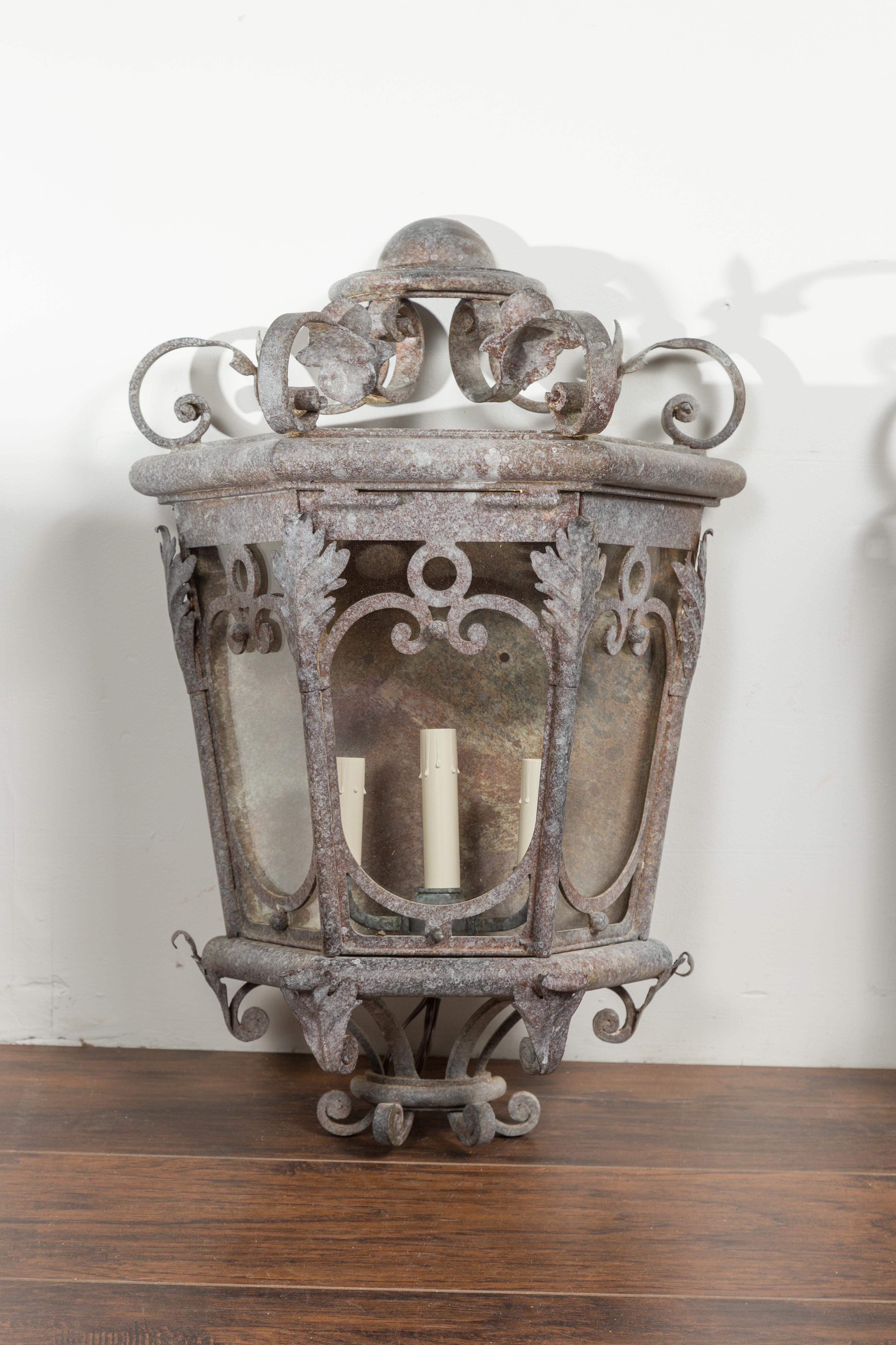 Pair of French 1920s Iron Three-Light Lanterns with Scrolling Motifs and Foliage In Good Condition For Sale In Atlanta, GA