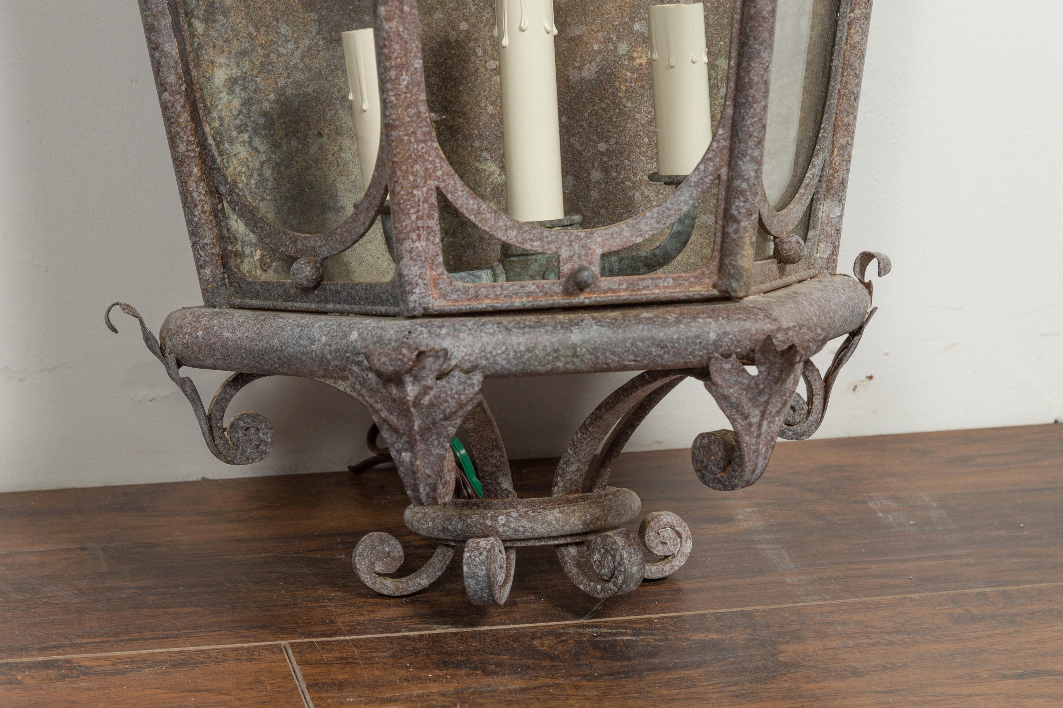 Pair of French 1920s Iron Three-Light Lanterns with Scrolling Motifs and Foliage For Sale 3