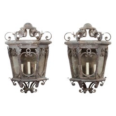 Antique Pair of French 1920s Iron Three-Light Lanterns with Scrolling Motifs and Foliage