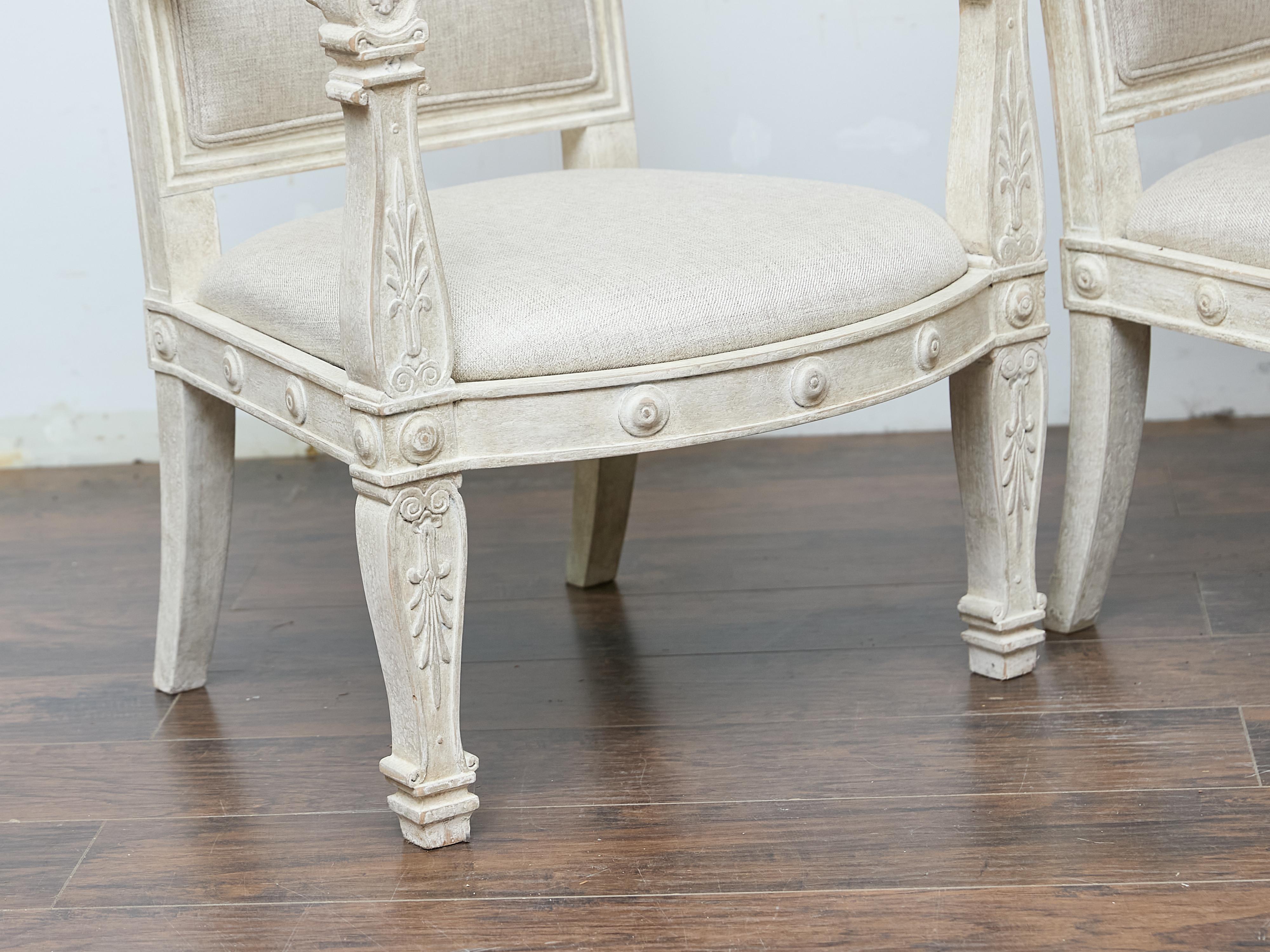 Pair of French 1920s Painted Armchairs with Carved Details and Linen Upholstery In Good Condition For Sale In Atlanta, GA