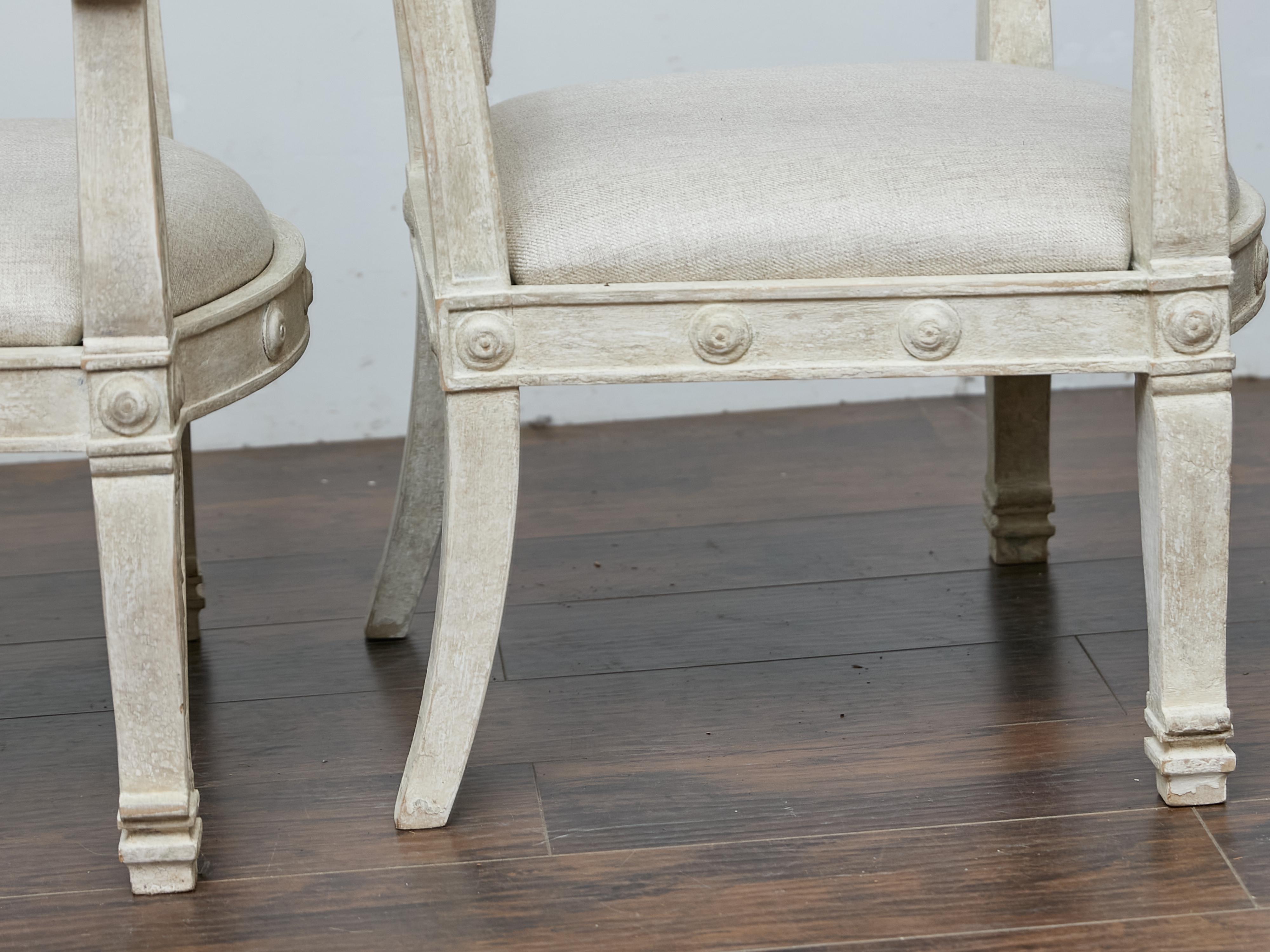 Fabric Pair of French 1920s Painted Armchairs with Carved Details and Linen Upholstery For Sale