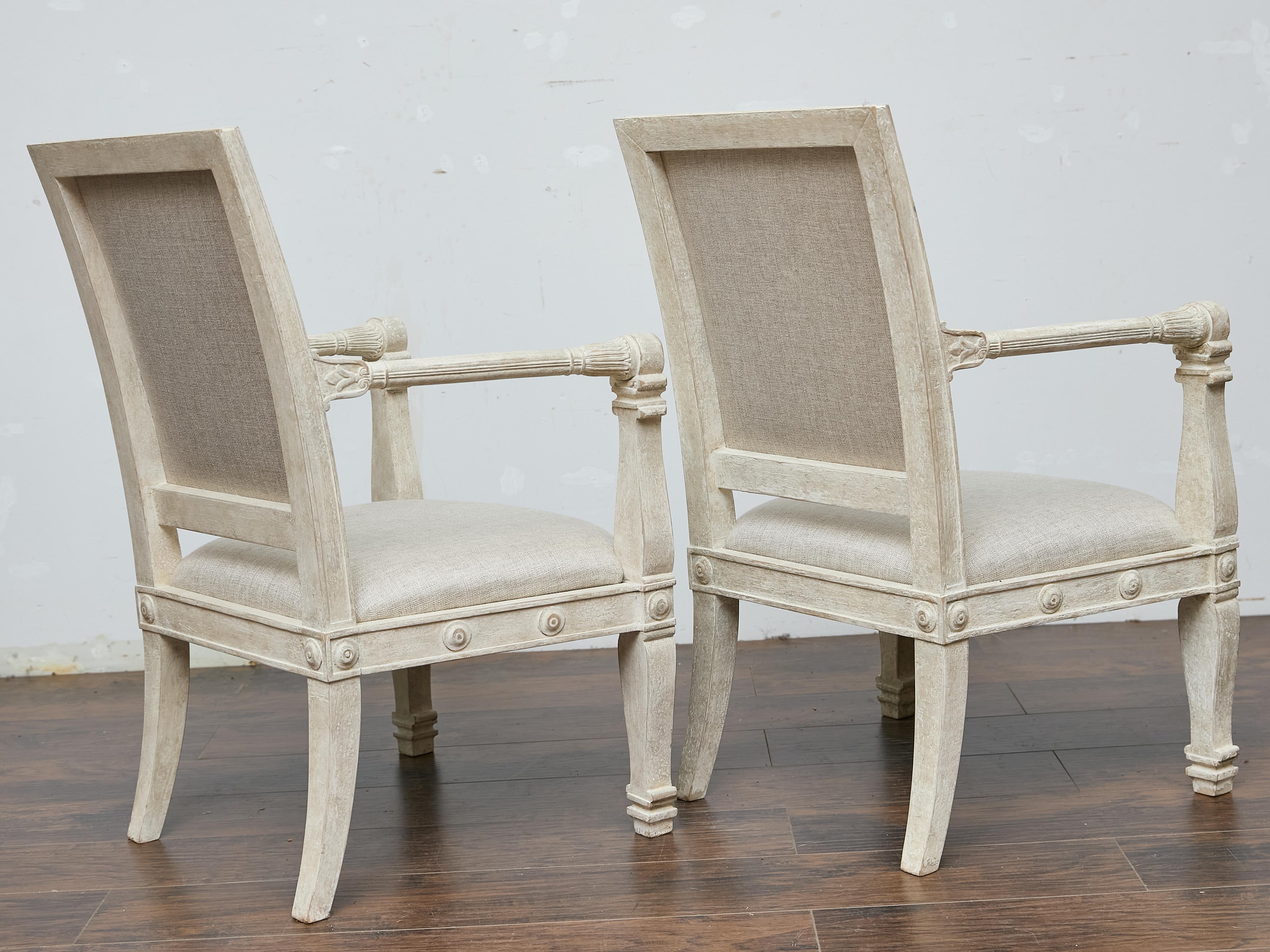 Pair of French 1920s Painted Armchairs with Carved Details and Linen Upholstery For Sale 1