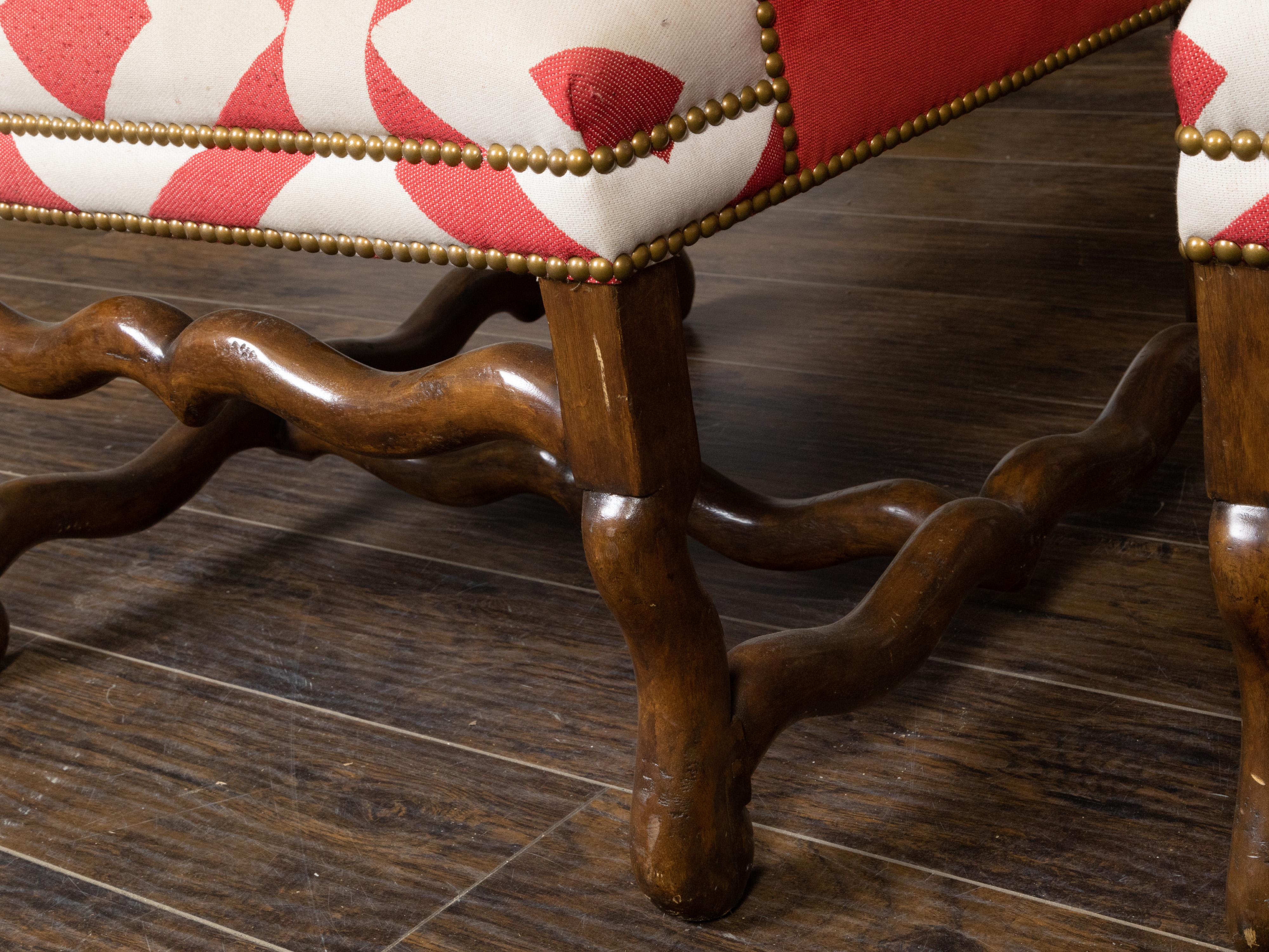 Tissu d'ameublement Paire de chaises Wingback françaises des années 1920 avec bases en os de mouton et tissu d'ameublement en vente
