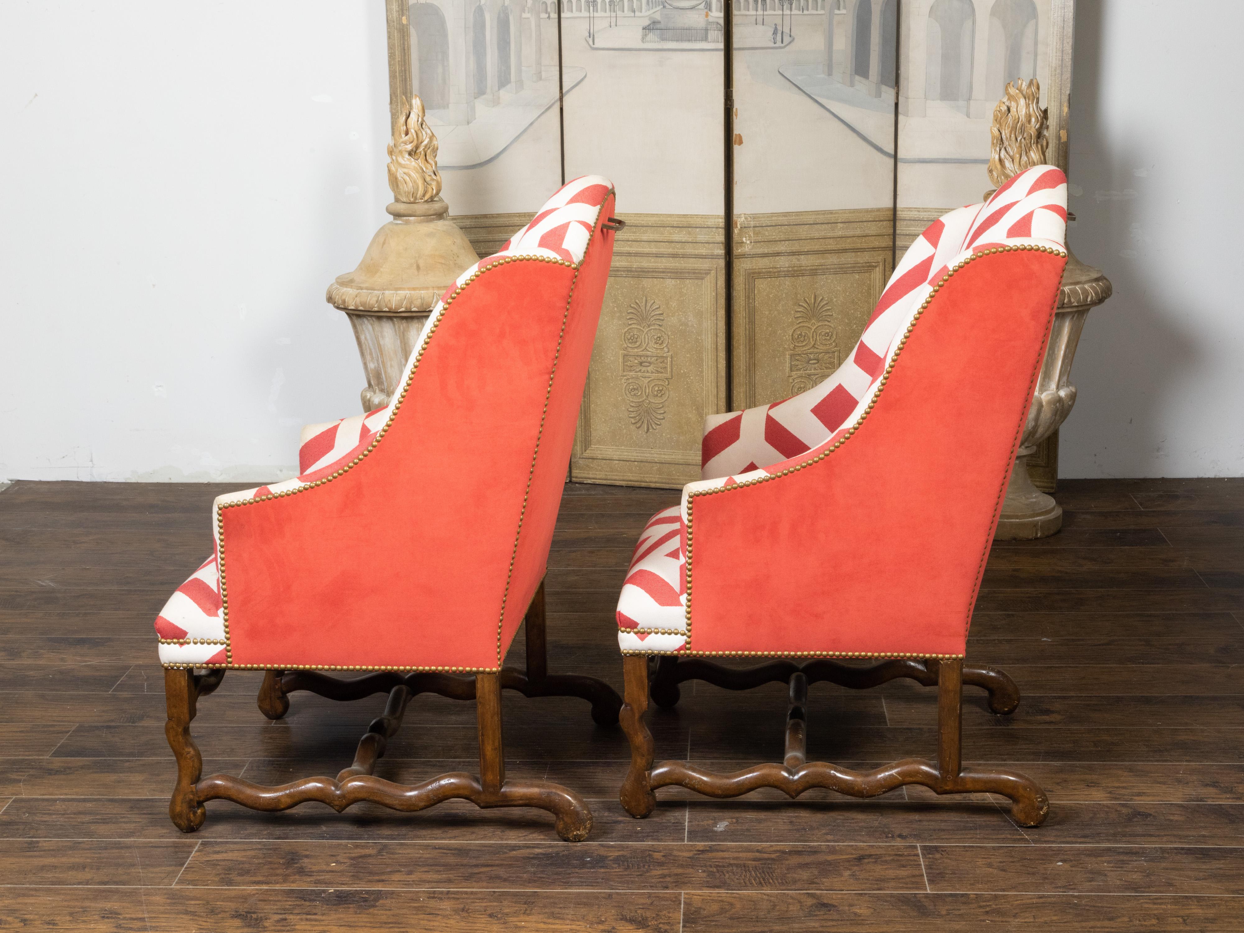 Carved Pair of French 1920s Wingback Chairs with Os De Mouton Bases and Upholstery For Sale