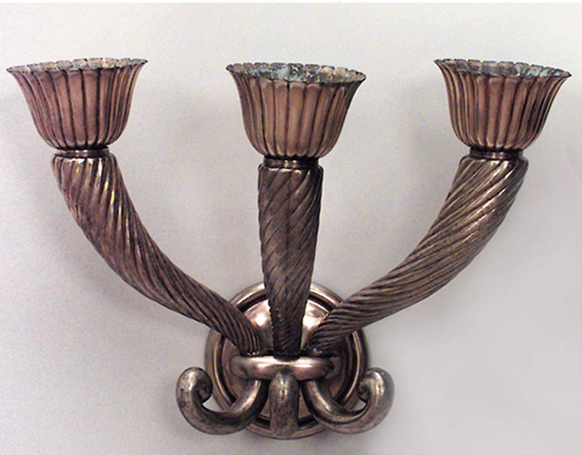 Pair of French Mid-Century (1940s) bronze wall sconces with three swirled cornucopia design arms. (PRICED AS Pair)
