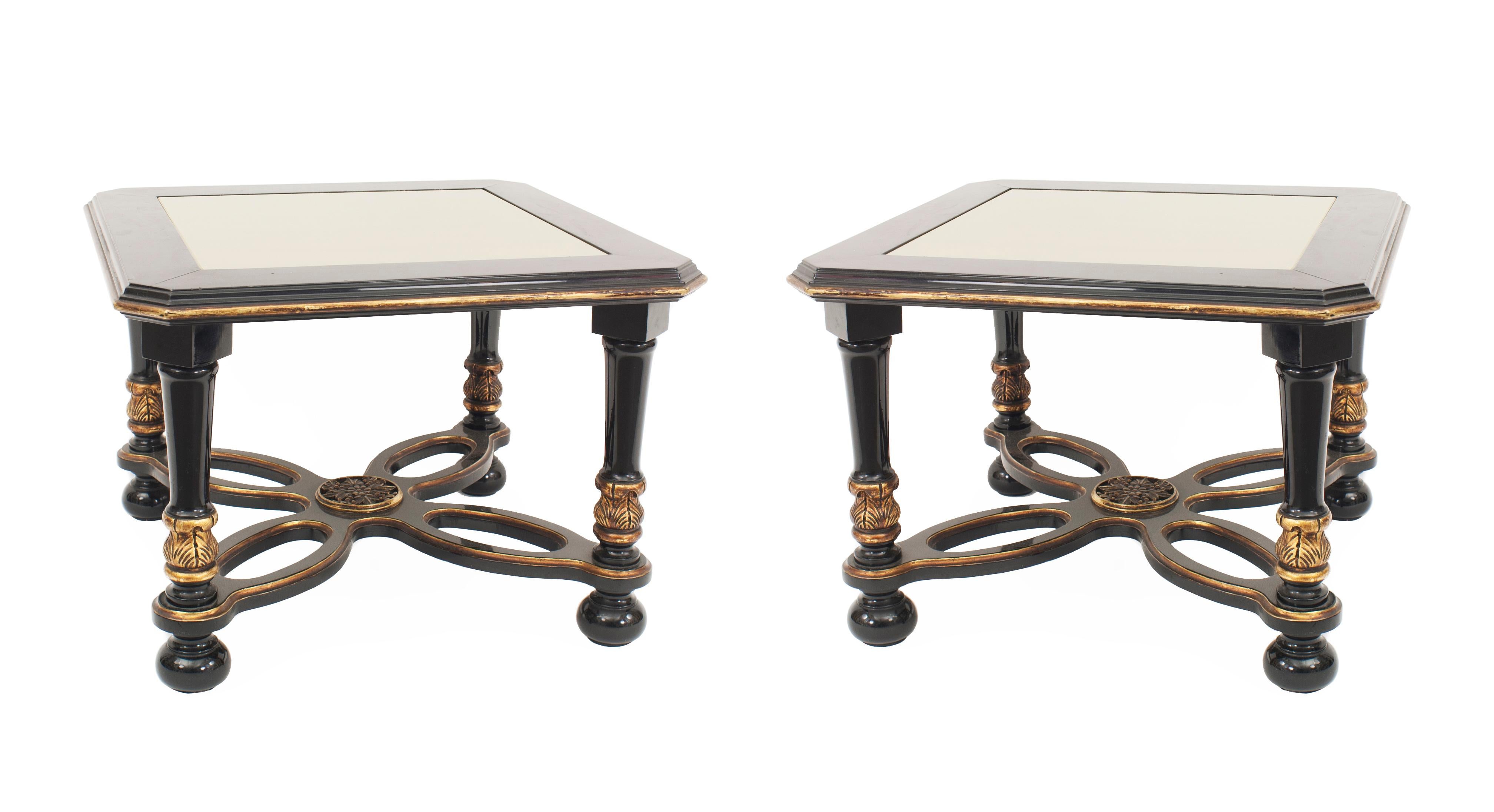 Pair of French Mid-Century (1940s) ebonized low end tables with an inset gold glass top and gilt trim with an open design stretcher (Attributed to MAISON JANSEN) (PRICED AS Pair)
