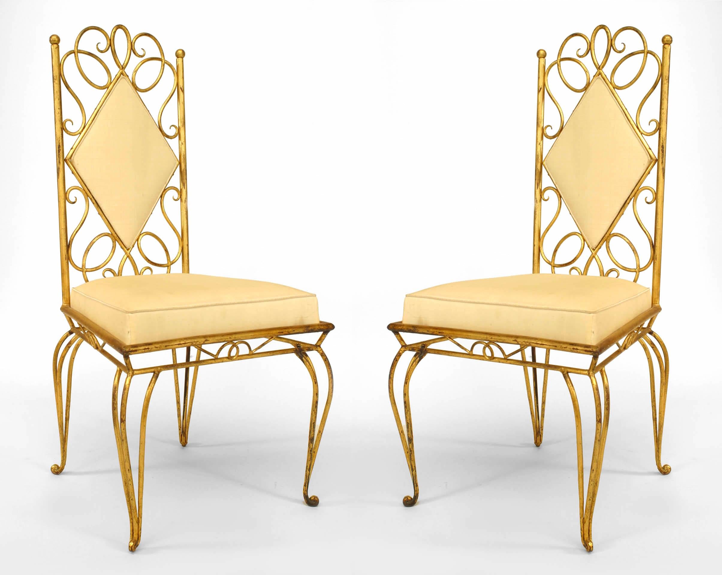 Pair of French 1940s gilt metal side chairs with scroll design and upholstered with an inset diamond shaped back panel and seat in off white fabric (att: RENE PROU)
