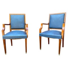Paire de fauteuils français des années 1940 en acajou et cuir