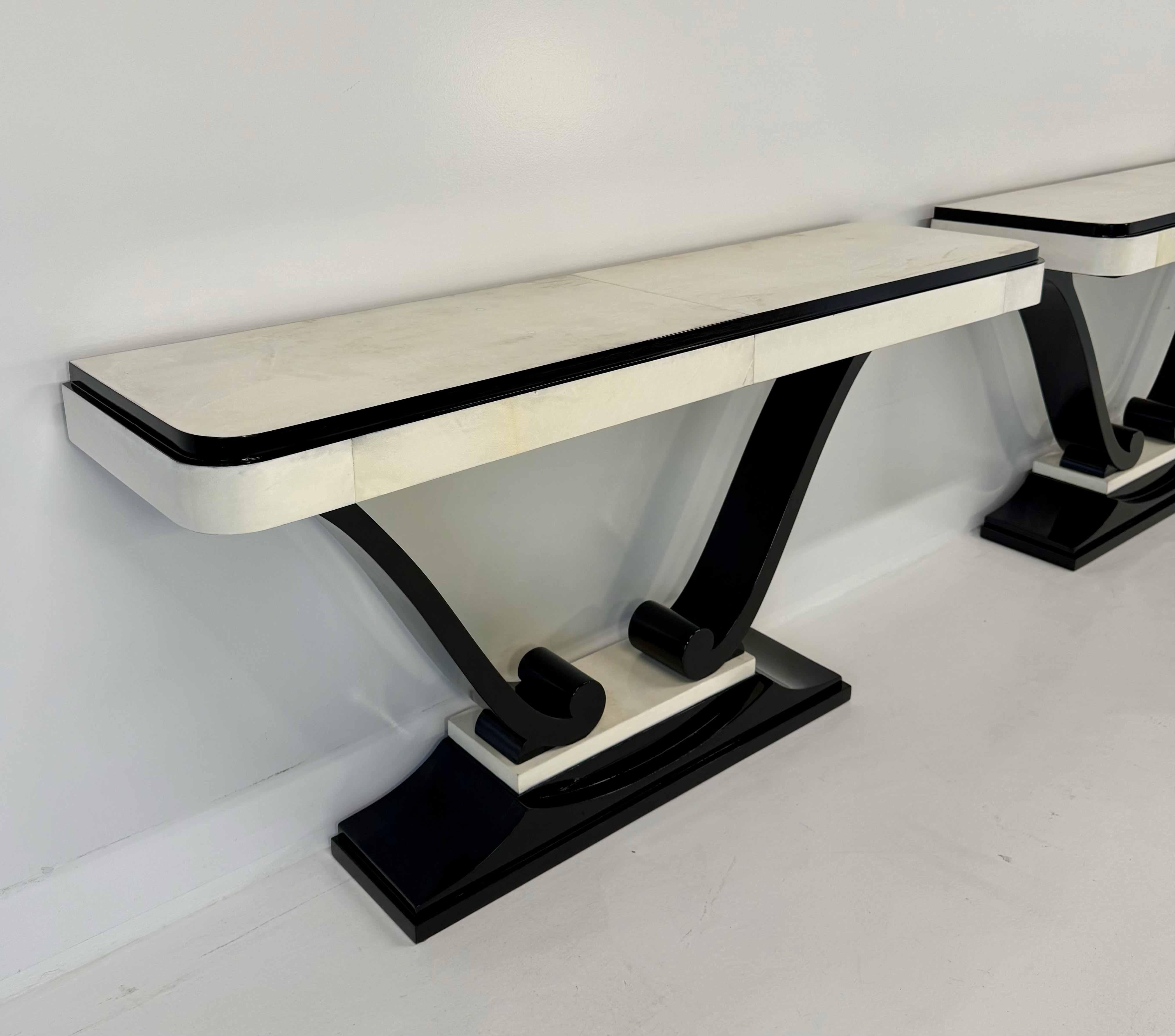 Mid-20th Century Pair of French 1940s Parchment and Black Ebonized Consoles For Sale