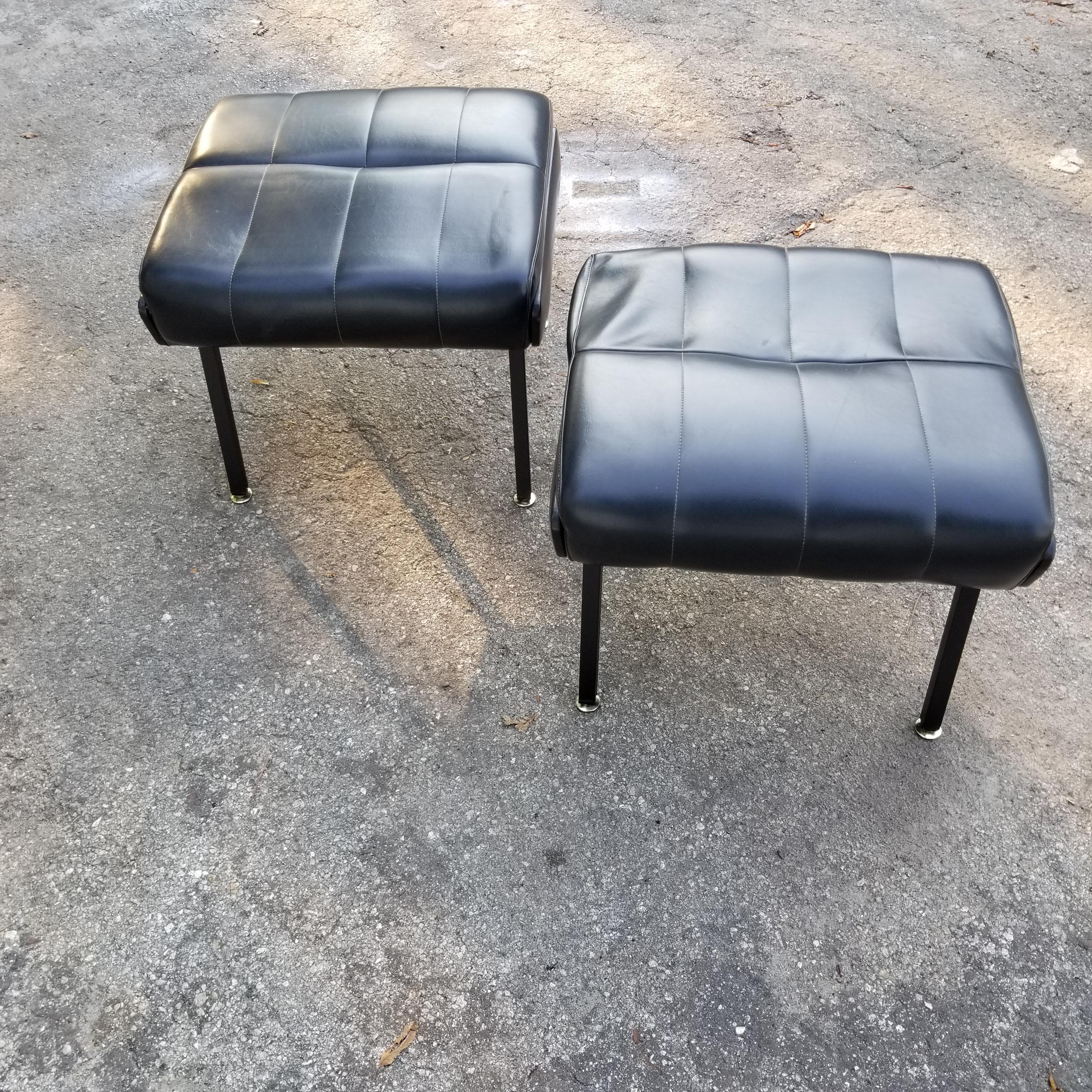 Pair of French 1950s ottoman, original vintage condition.
Black faux leather, brass feet.
   
