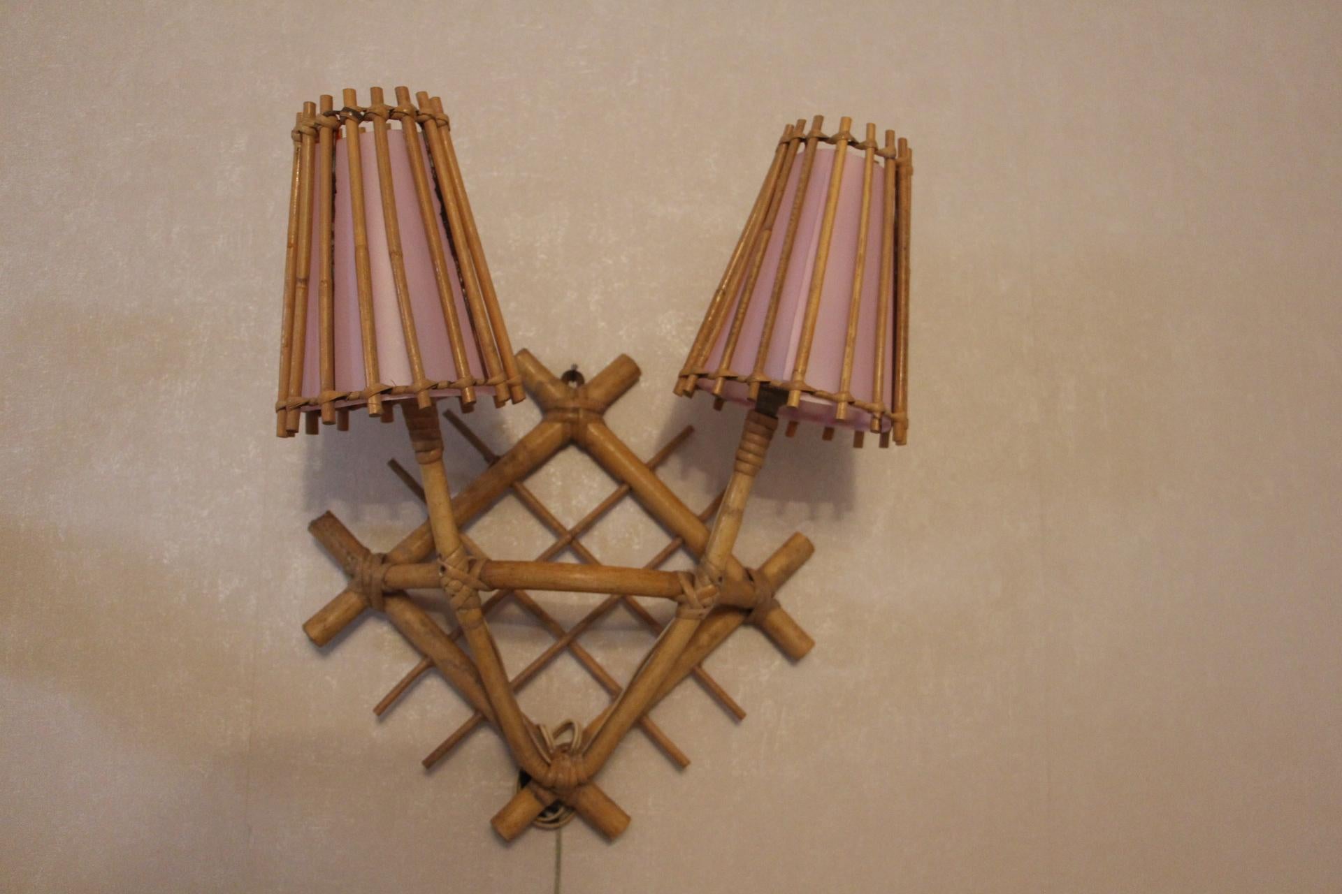 Pair of French 1960's Rattan Sconces by Louis Sognot with Light Pink Lampshades 9