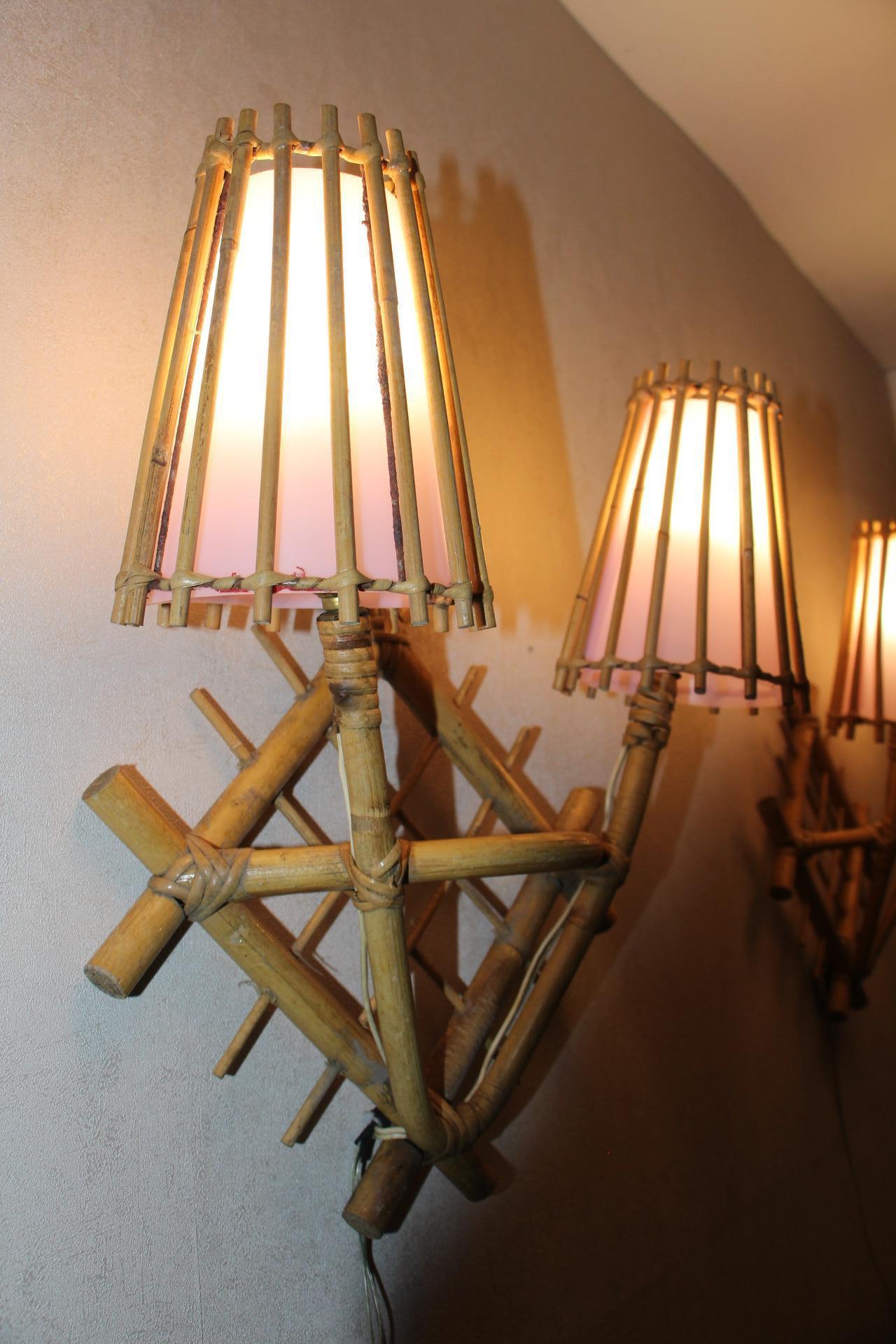 Mid-20th Century Pair of French 1960's Rattan Sconces by Louis Sognot with Light Pink Lampshades