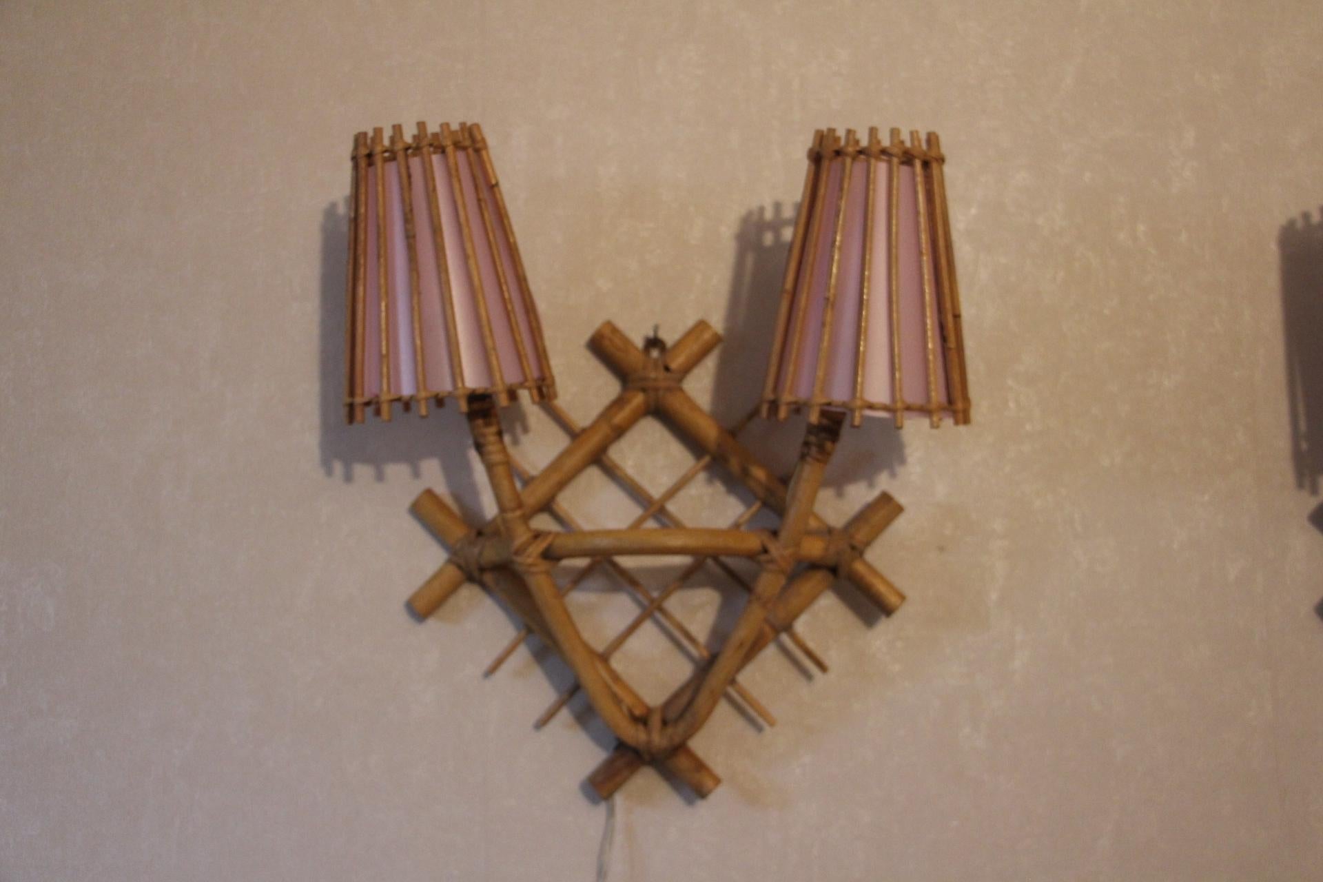 Pair of French 1960's Rattan Sconces by Louis Sognot with Light Pink Lampshades 3