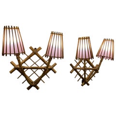 Pair of French 1960
s Rattan Sconces by Louis Sognot with Light Pink Lampshades Pair of French 1960
s Rattan Sconces by Louis Sognot with Light Pink Lampshades
