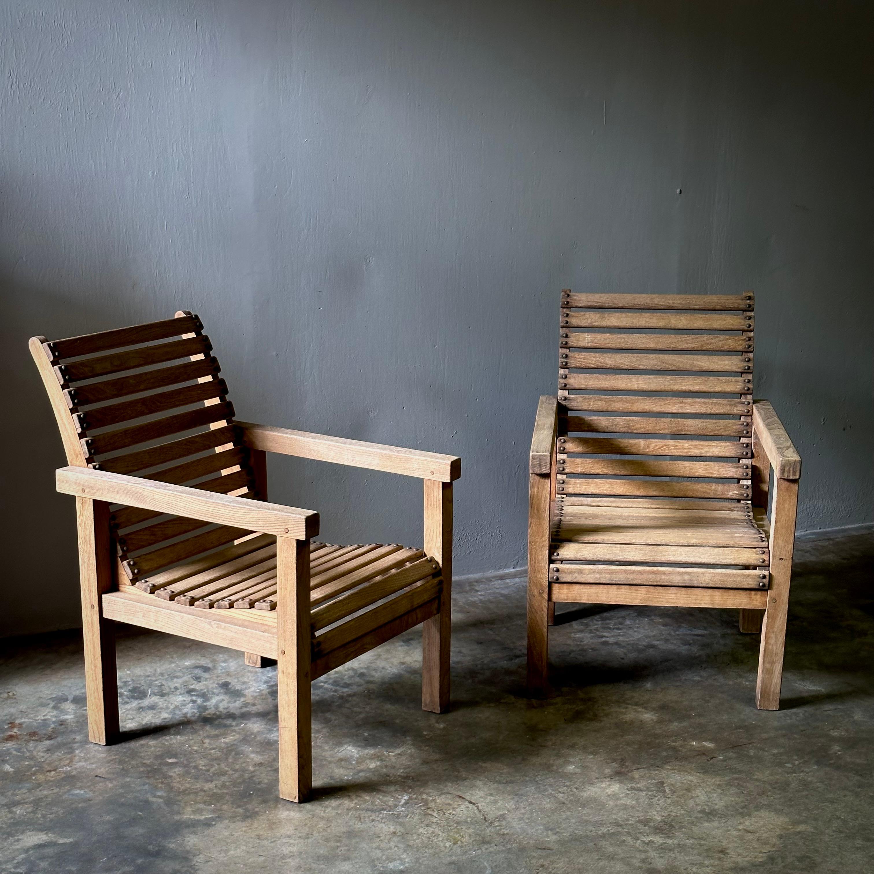 Pair of 1970s French ash wood armchairs. Simple yet refined with great lines and a warm, sunny disposition. Suitable for indoor and outdoor use alike. 

France, circa 1970

Dimensions: 27.5W x 21.6D x 33.4H