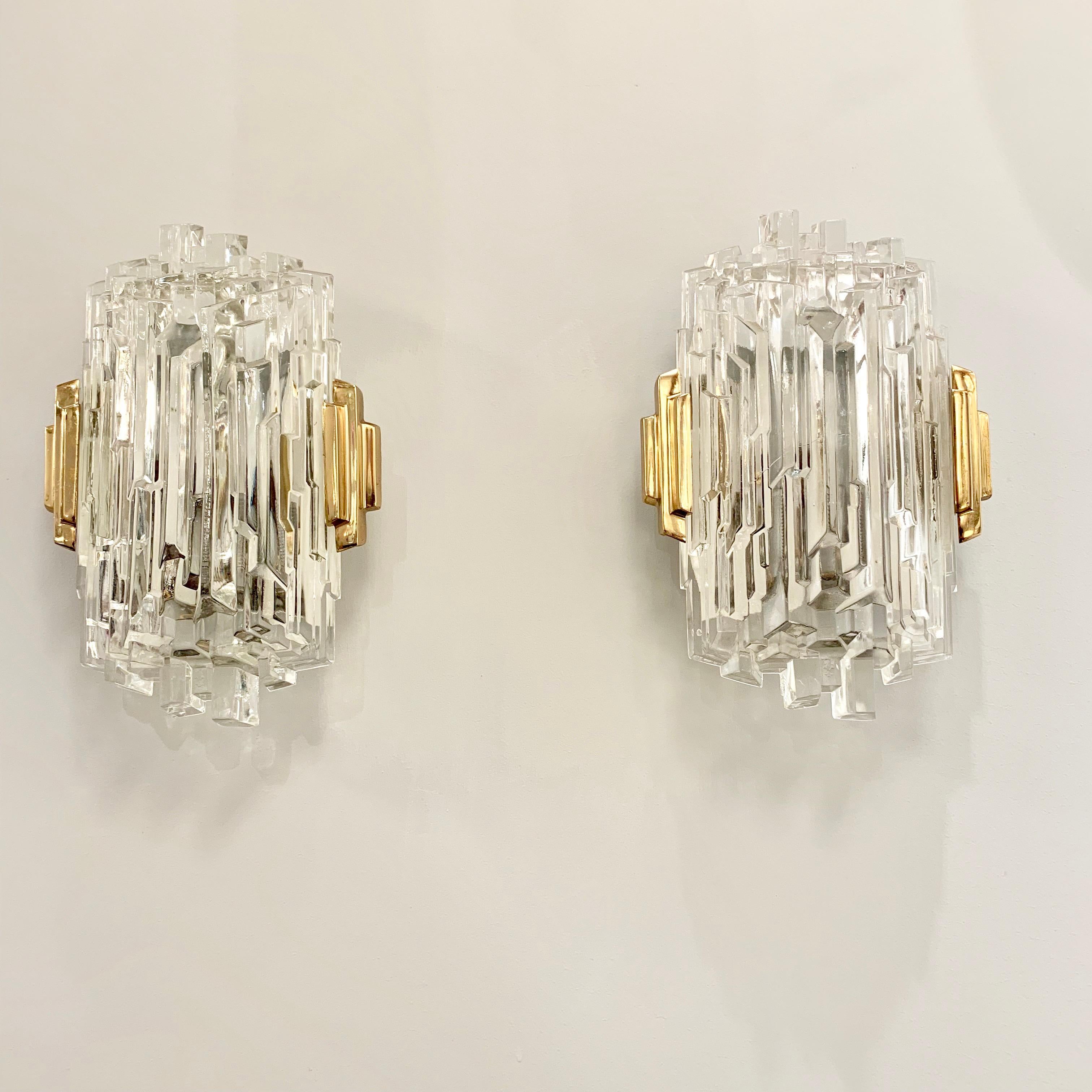 A wonderful pair of 1970s ice crystal wall lights with polished brass frames. Newly rewired.