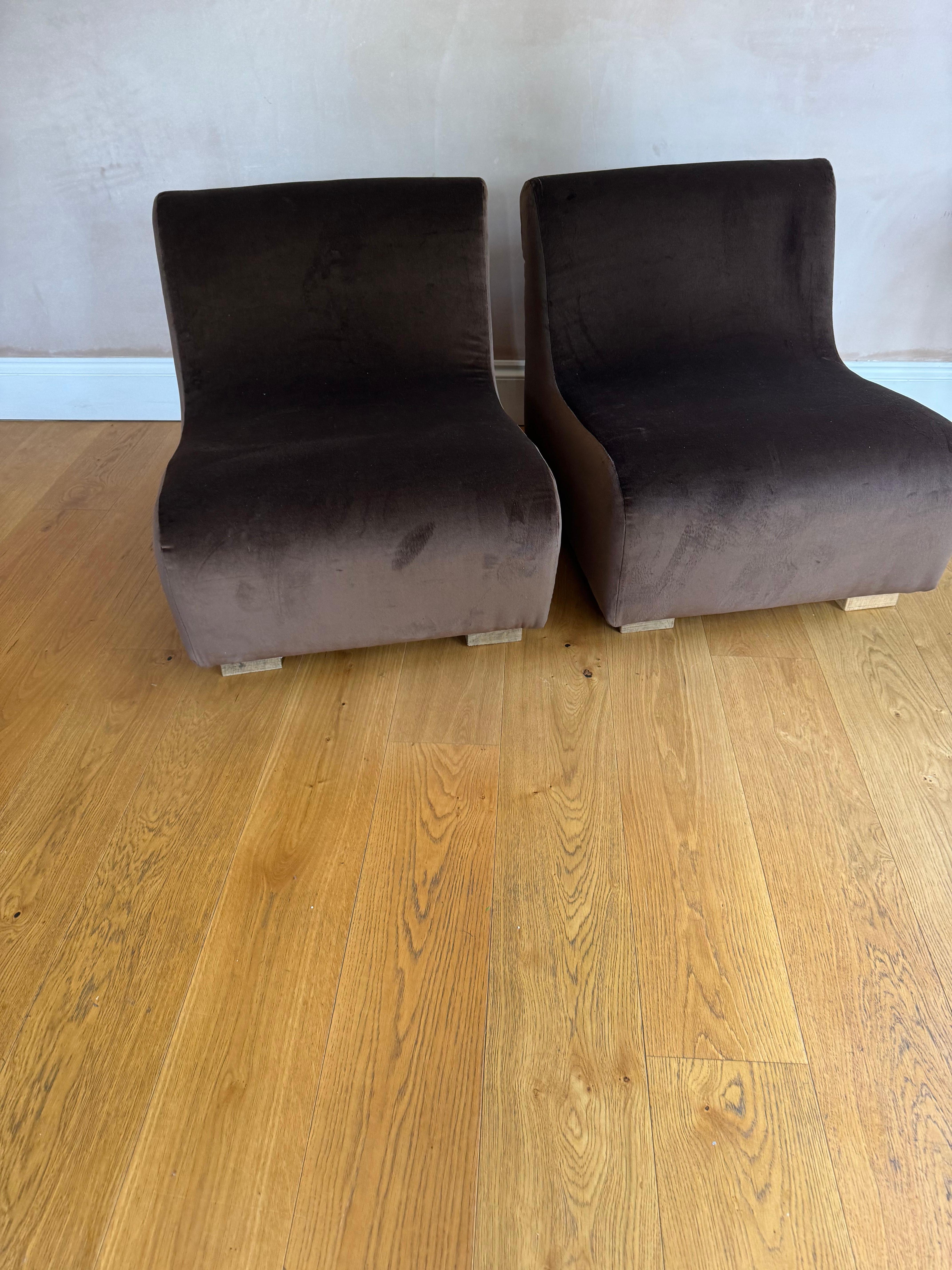 A fabulous pair of low French 1970’s slipper chairs reupholstered in brown velvet on oak feet.