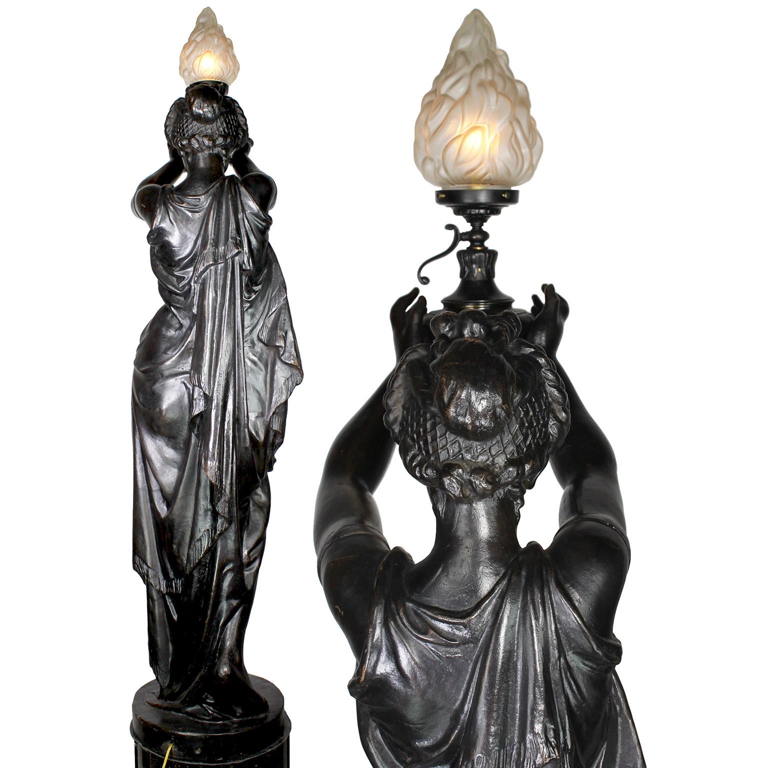 Pair of French 19th-20th Century Neoclassical Style Cast Iron Figural Torchères In Fair Condition For Sale In Los Angeles, CA