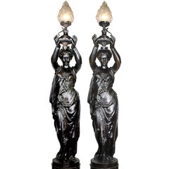 Pair of French 19th-20th Century Neoclassical Style Cast Iron Figural Torchères