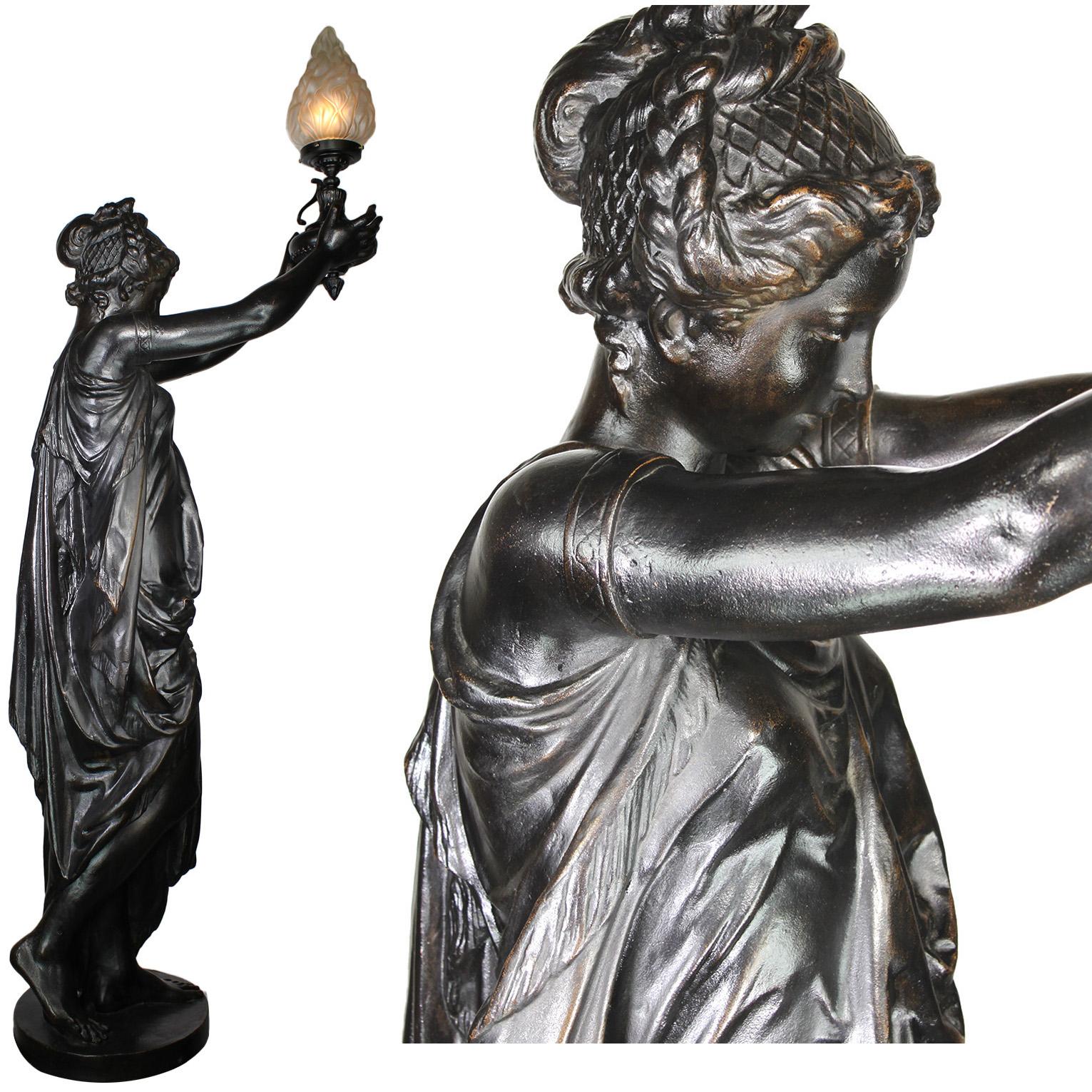 Patinated Pair of French 19th-20th Century Neoclassical Style Cast Iron Figural Torchères For Sale