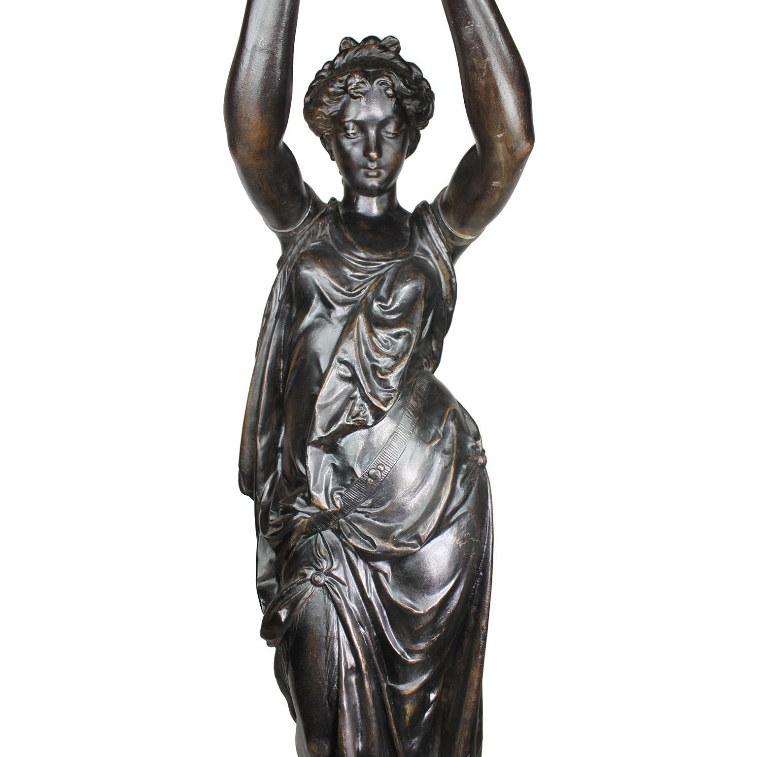 Early 20th Century Pair of French 19th-20th Century Neoclassical Style Cast Iron Figural Torchères For Sale