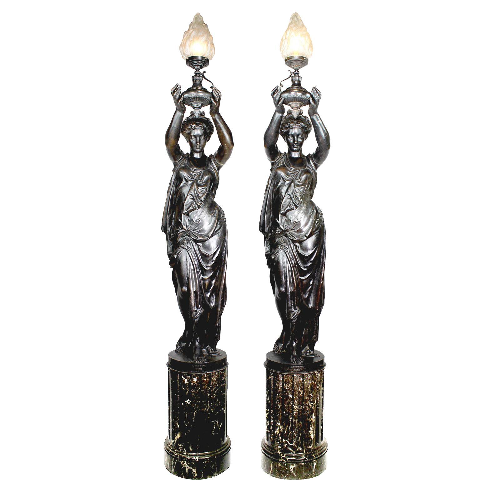 Pair of French 19th-20th Century Neoclassical Style Cast Iron Figural Torchères